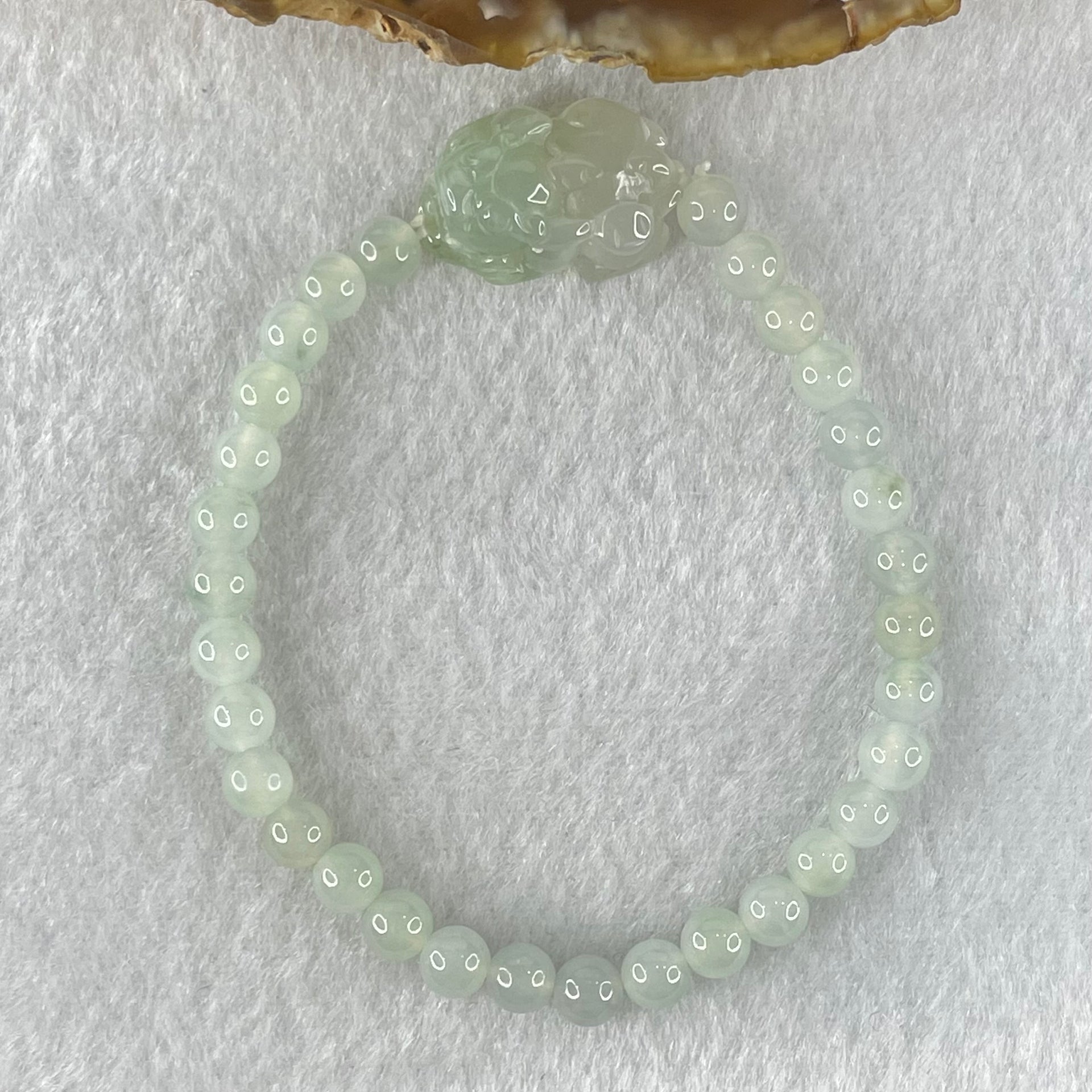 Type A Faint Blueish Green Jadeite Beads with Light Blueish Green Male Pixiu Charm Bracelet 12.93g 15.5cm 5.5cm 31 Beads 21.6 by 14.1 by 10.7mm - Huangs Jadeite and Jewelry Pte Ltd