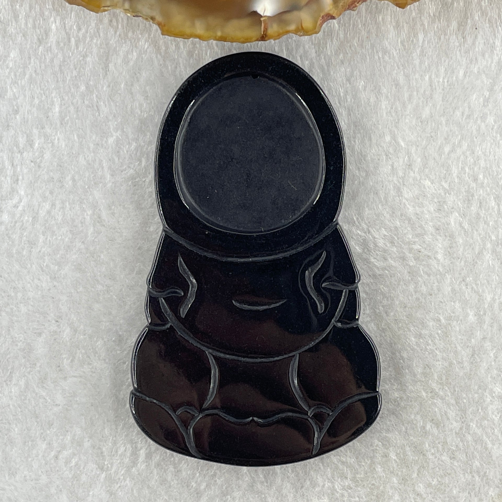 Type A Opaque Black Omphacite Jadeite Guan Yin Pendant 28.39g 63.4 by 38.8 by 7.5mm - Huangs Jadeite and Jewelry Pte Ltd