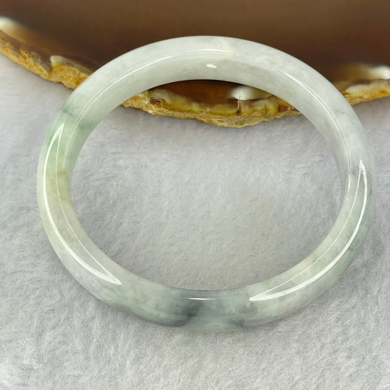 Type A Lavender Green with Grey Wuji Piao Hua Jadeite Oval Bangle Internal Diameter 56.0mm 44.31g 12.7 by 7.7mm (Slight Internal Lines) - Huangs Jadeite and Jewelry Pte Ltd