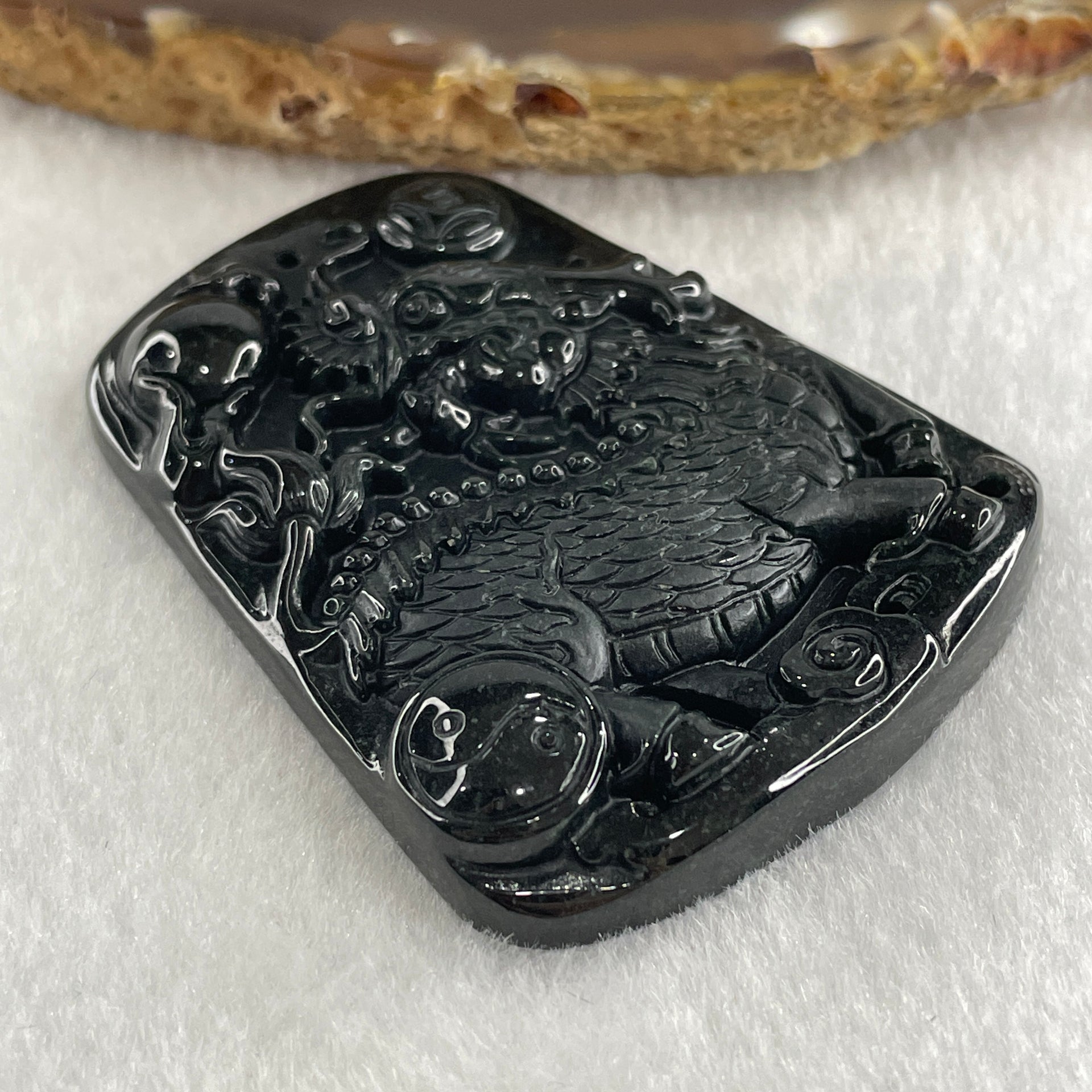 Type A Opaque to Partial Translucent Black Omphacite Jadeite Kirin Qilin Pendant 30.64g 55.7 by 43.5 by 8.5mm - Huangs Jadeite and Jewelry Pte Ltd