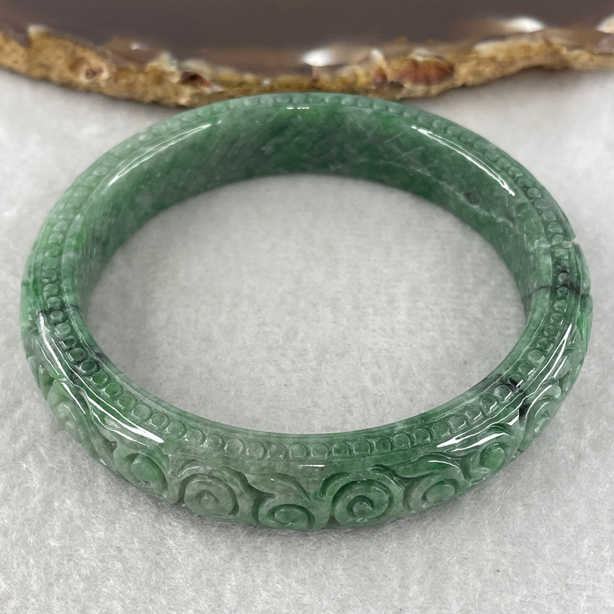 Natural Type Green Jadeite Prosperity Flowers Bangle 46.28g Inner Diameter 55.6mm 12.1 by 8.2mm (External Line) - Huangs Jadeite and Jewelry Pte Ltd