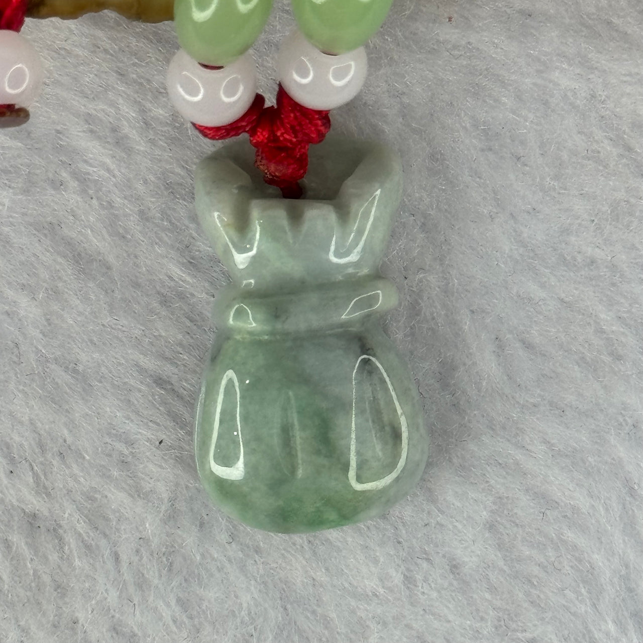 Type A Green Jadeite Money Bag Pendent 7.80g 24.9 by 14.4 by 8.2mm - Huangs Jadeite and Jewelry Pte Ltd
