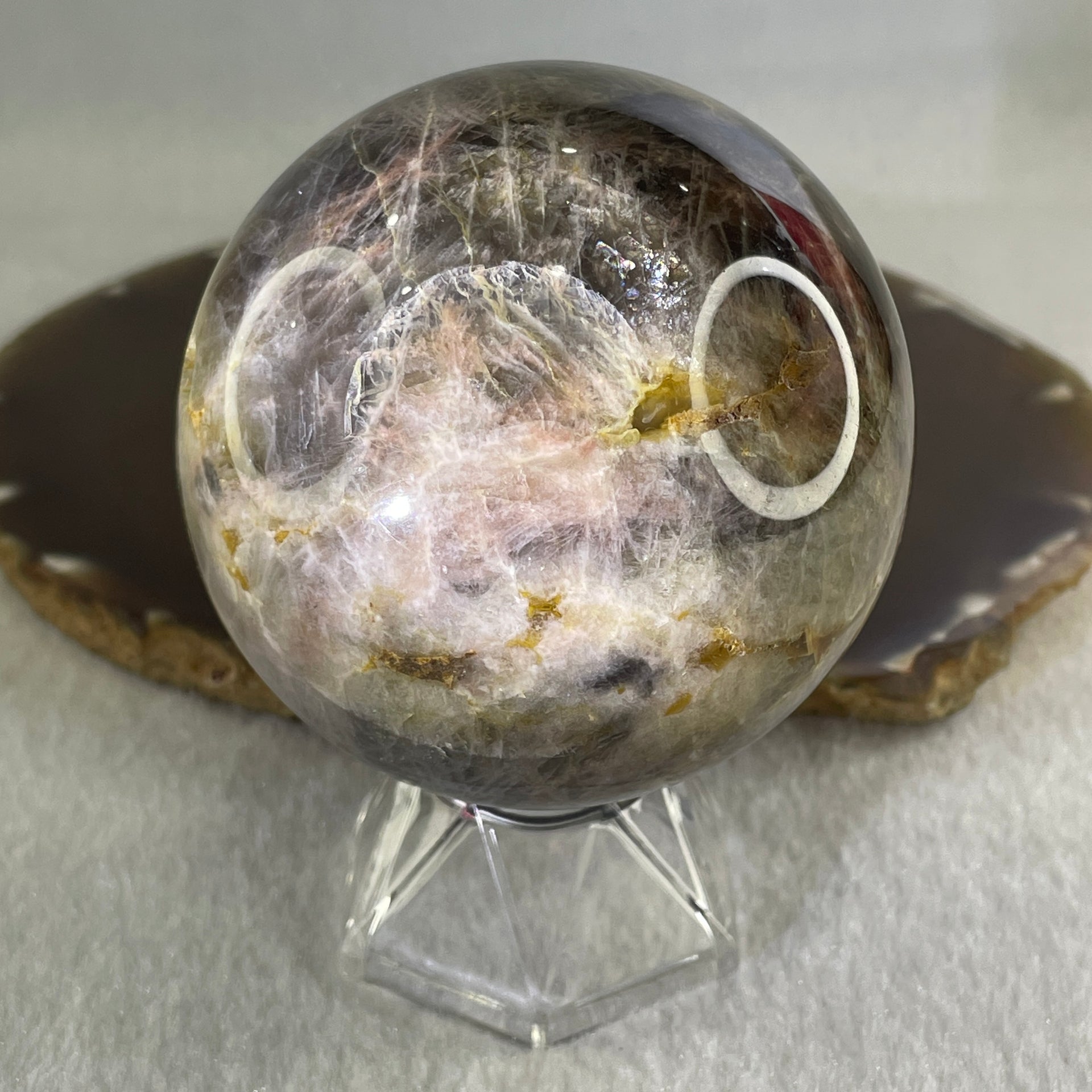 Natural Black Moonstone Ball with Clear Acrylic Display 443.95g 69.0 by 90.0mm - Huangs Jadeite and Jewelry Pte Ltd