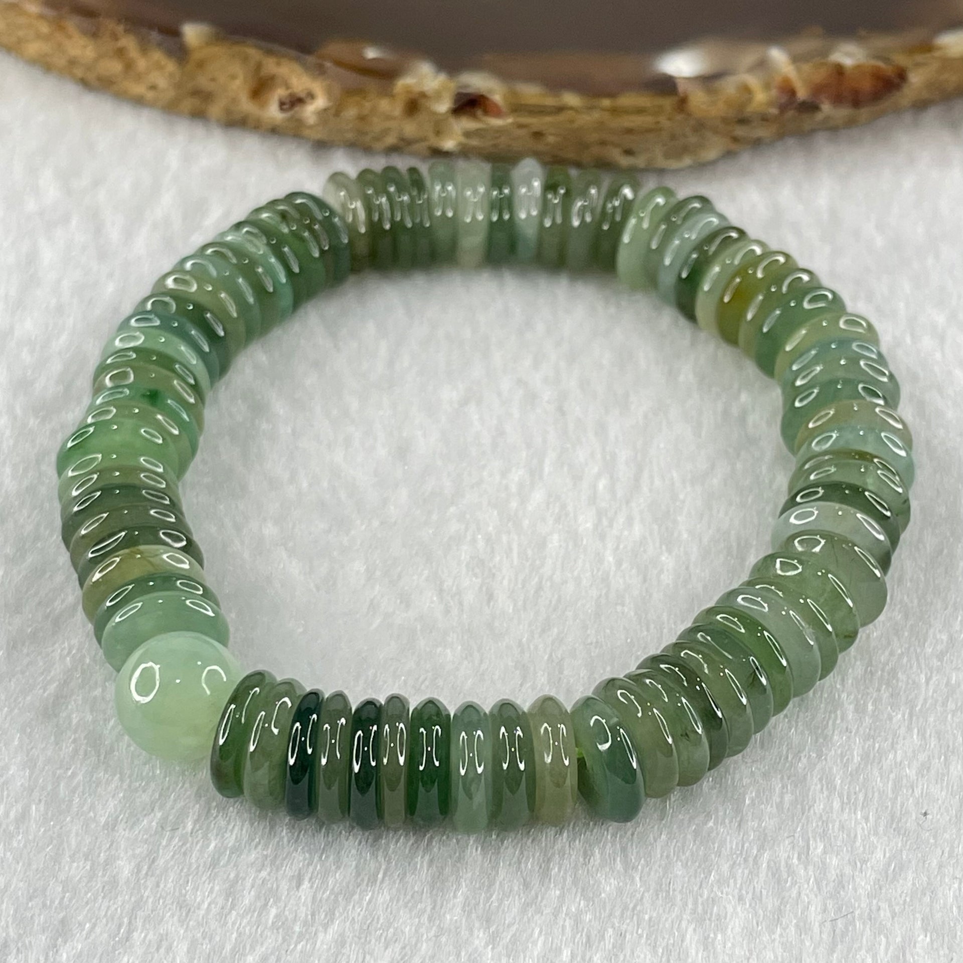 Type A Muti Blueish Green Shades with Yellowish Brown Jadeite Ping An Kou Donut with Jadeite Bead Bracelet 30.03g 15cm 9.0mm 74pcs 8.8mm 1 Beads - Huangs Jadeite and Jewelry Pte Ltd