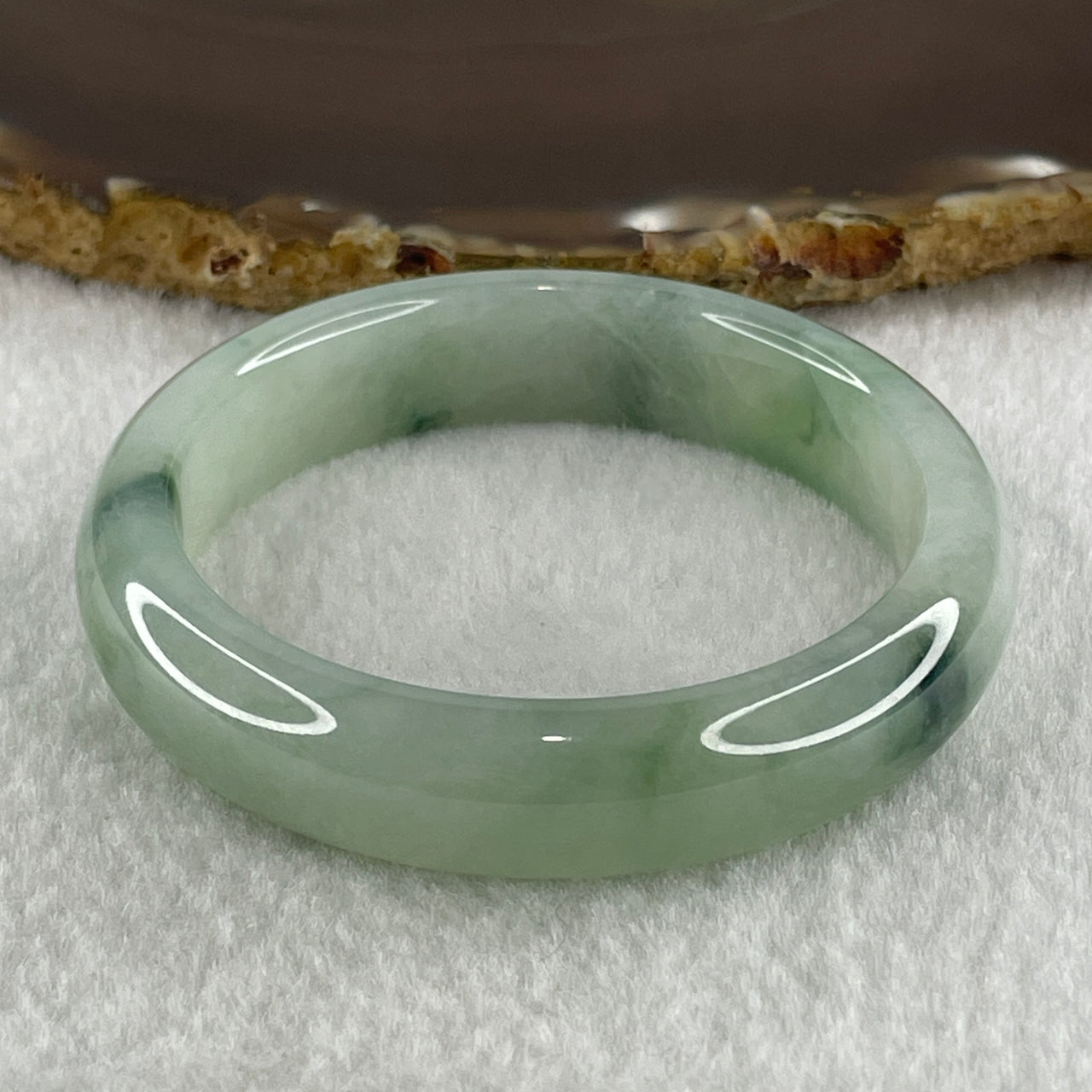 Type A Natural Jelly Light Green with Blueish Green Flora Piao Hua Jadeite Bangle 44.63g Inner Diameter 50.7mm 12.3 by 8.3mm (Internal Lines) - Huangs Jadeite and Jewelry Pte Ltd