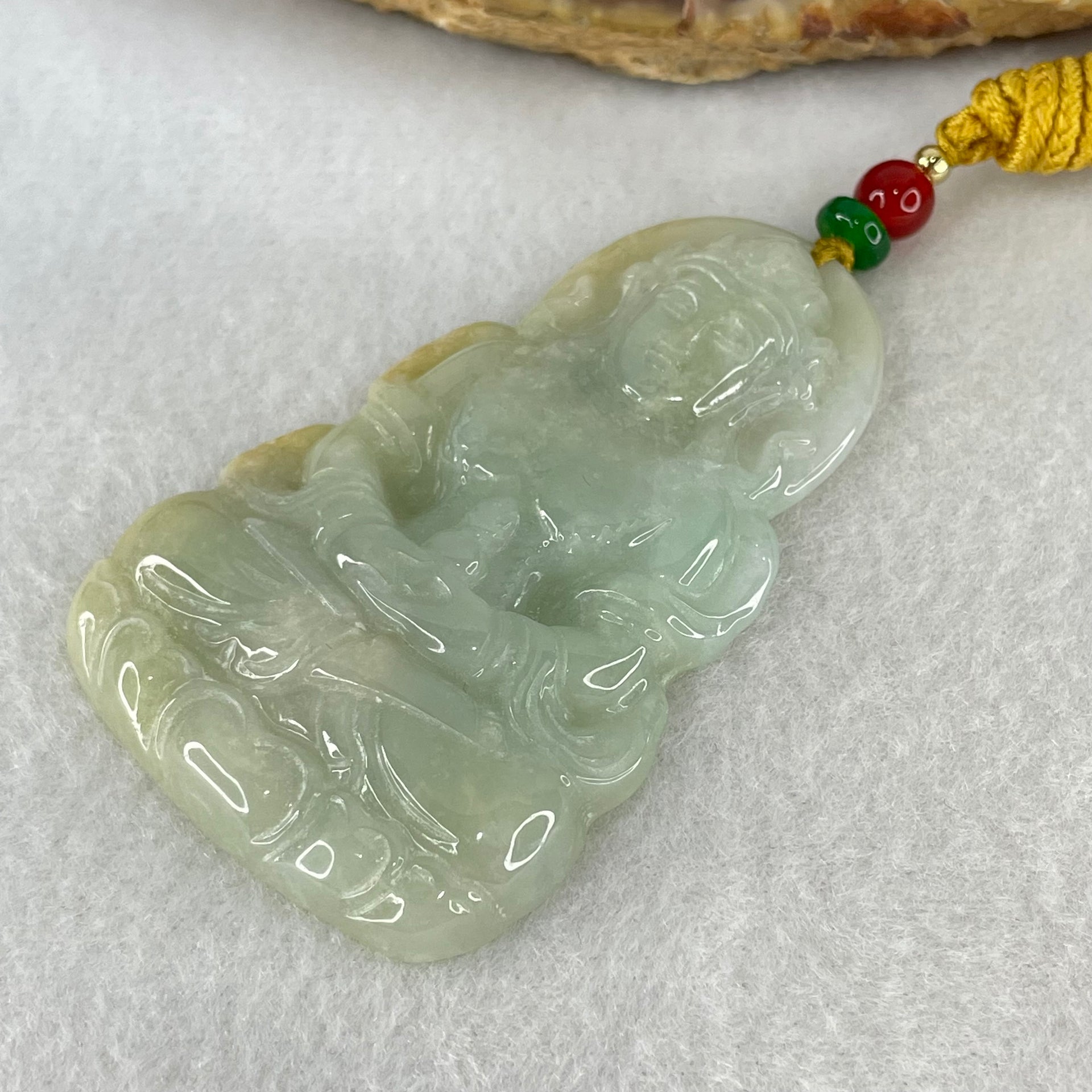 Type A Light Blueish Green with Yellow Jadeite Guan Yin Tara Pendant 29.14g 60.1 by 38.8 by 6.5mm - Huangs Jadeite and Jewelry Pte Ltd