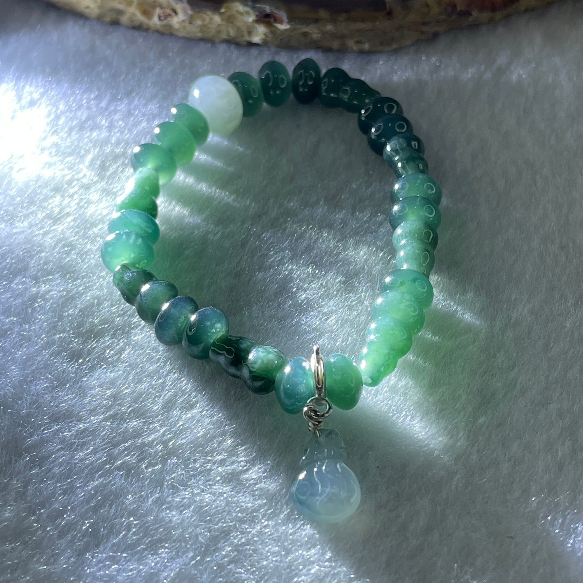Natural Type A Blueish Green Jadeite Donut Shape Beads with Hulu Shape Charm with Icy Colorless Jadeite Hulu Charm Bracelet 11.79g 12cm 6.9mm 18 Beads Hulu 9.3 by 6.0mm 7 Pieces - Huangs Jadeite and Jewelry Pte Ltd