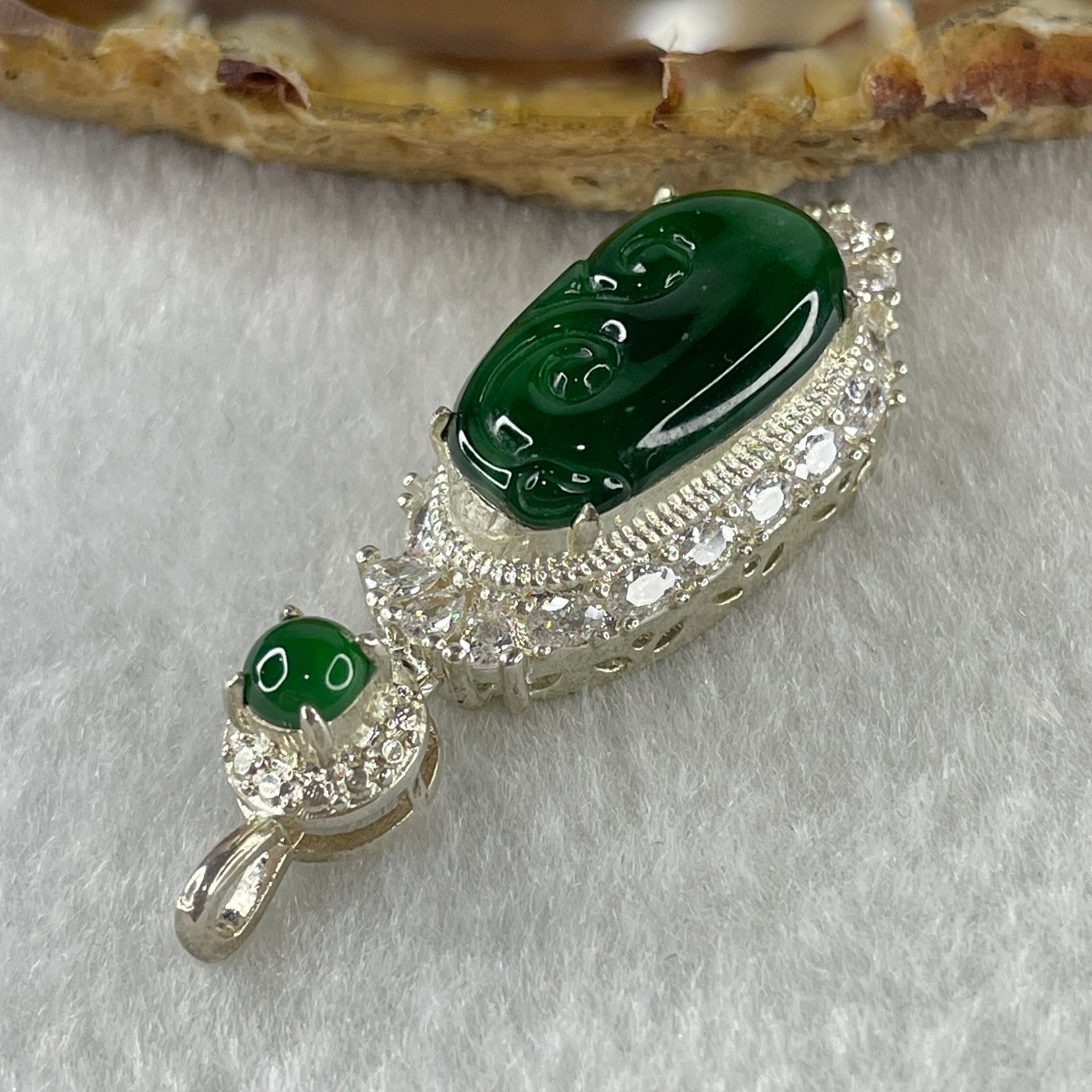 Type A Natural Semi Icy Bright Green Jadeite Ruyi Stone for Setting 19.0 by 10.8 by 2.5mm (On Silver Pendant Mold) 6.75g - Huangs Jadeite and Jewelry Pte Ltd