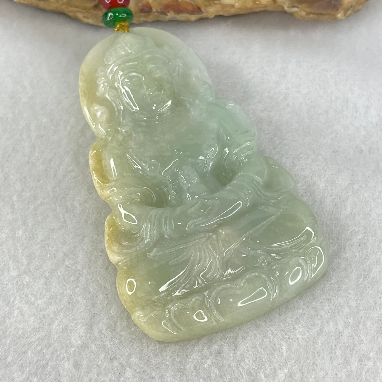 Type A Light Blueish Green with Yellow Jadeite Guan Yin Tara Pendant 29.14g 60.1 by 38.8 by 6.5mm - Huangs Jadeite and Jewelry Pte Ltd