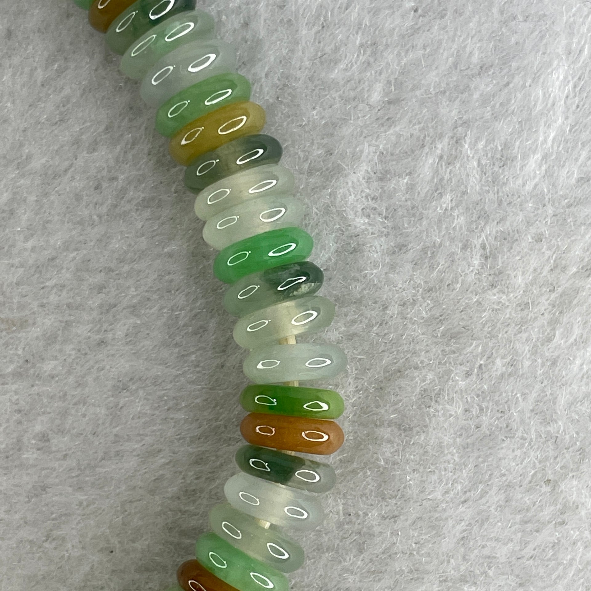 Natural Type A Muti Color Green with Yellow Blueish Green Colorless Jadeite Donut Beads Bracelet 19.89g 16cm 7.1mm 80 Pcs - Huangs Jadeite and Jewelry Pte Ltd