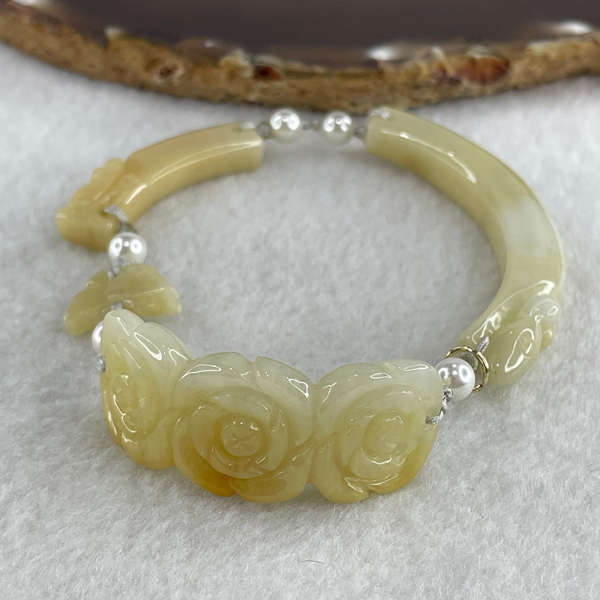 Natural Type A Light Yellowish with Light Green Jadeite Flowers with Dragon Head and Butterfly Bracelet 25.67g 7.2 by 8.4mm - Flower 40.4 by 16.5 by 6.1mm - Huangs Jadeite and Jewelry Pte Ltd