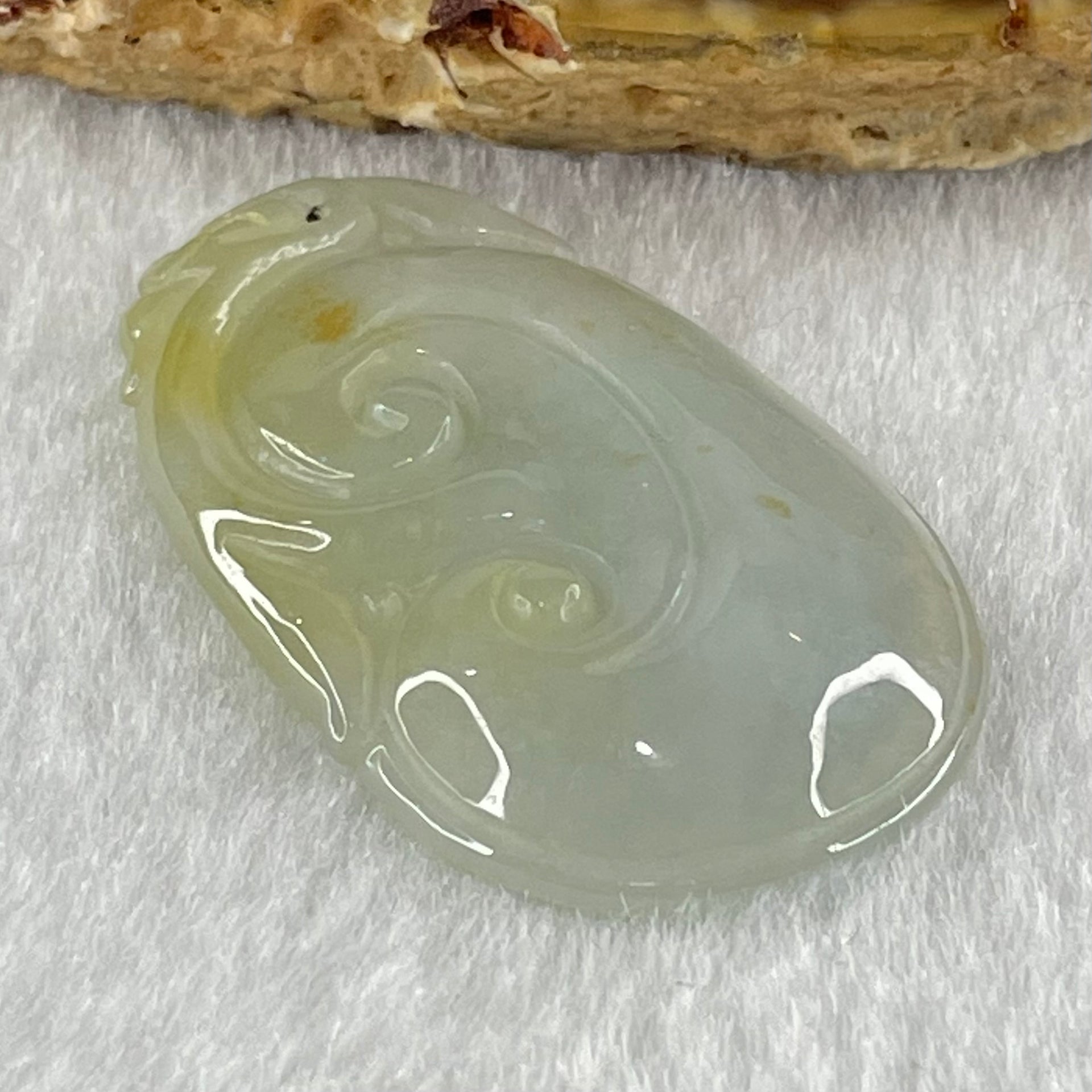 Type A Faint Lavender Green with Yellow Spots Jadeite Ruyi Pendant 6.92g 35.3 by 22.0 by 5.3mm - Huangs Jadeite and Jewelry Pte Ltd