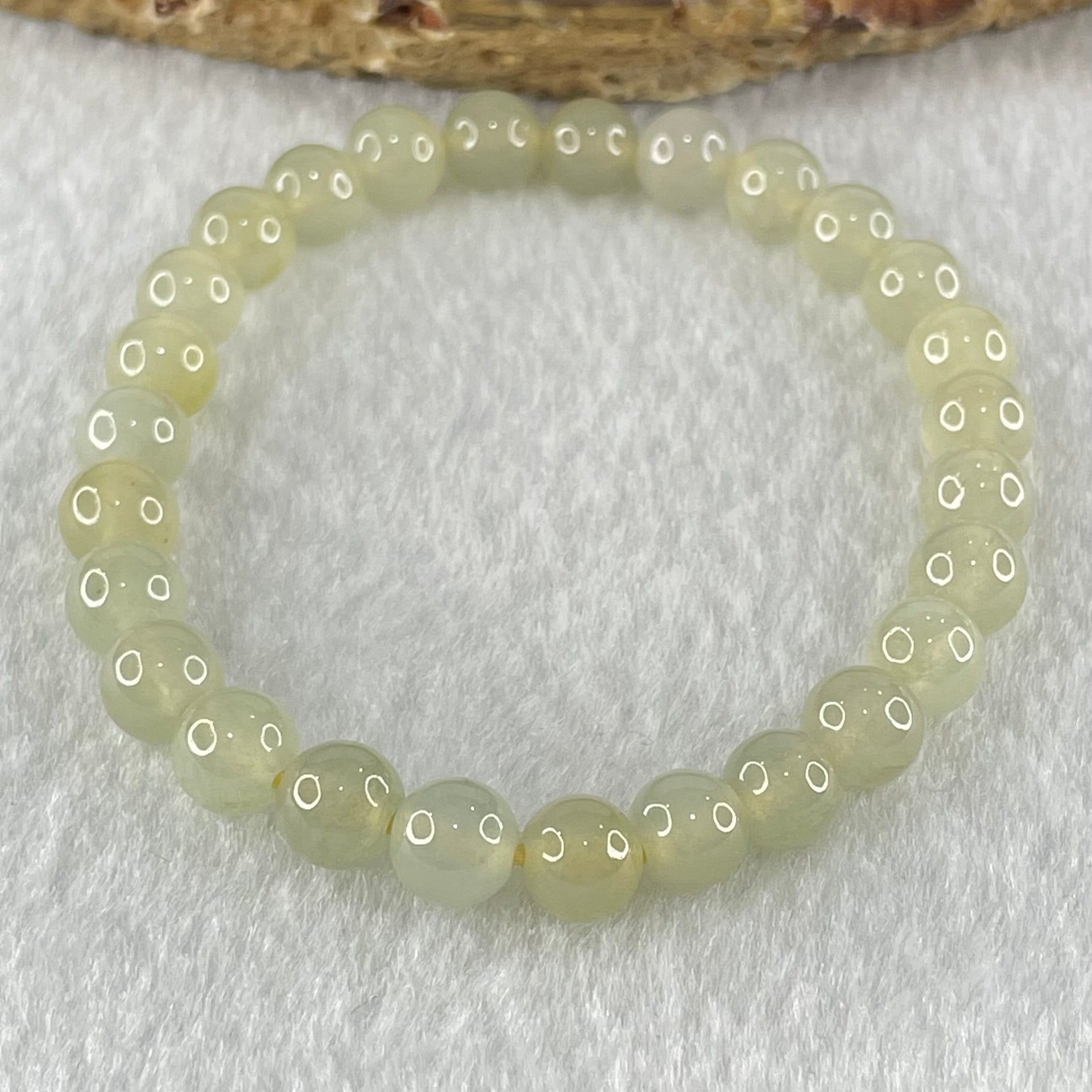 Type A Semi Icy Light Yellowish Blueish Green Jadeite Beads Bracelet 13.73g 14.5cm 6.8mm 27 Beads - Huangs Jadeite and Jewelry Pte Ltd