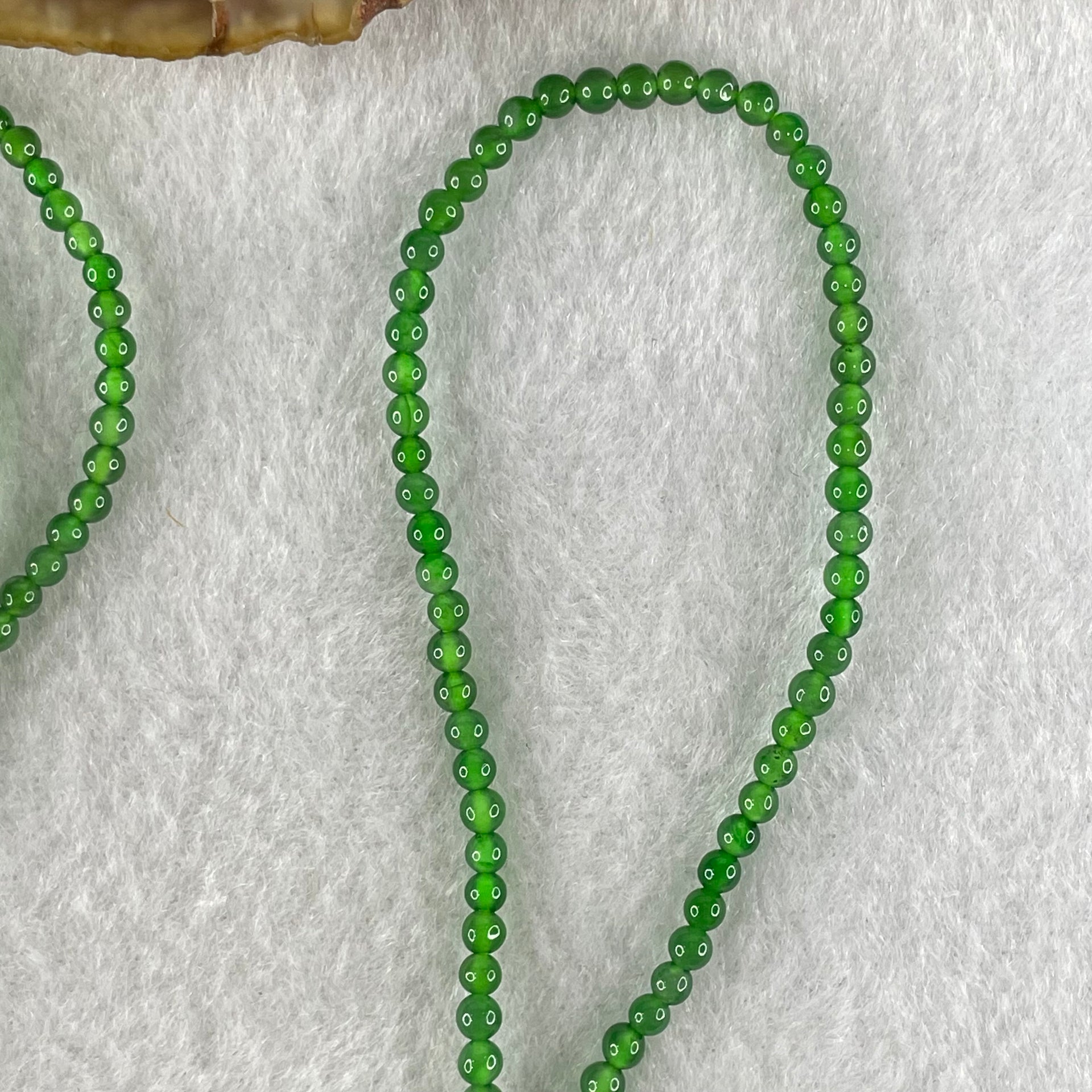 Rare Tengchong Raw Stone Association Certified Type A Highly Translucent Green Jadeite Beads Necklace 8.44g 54g 2.40 to 2.92mm With NGI Cert 82838749 - Huangs Jadeite and Jewelry Pte Ltd