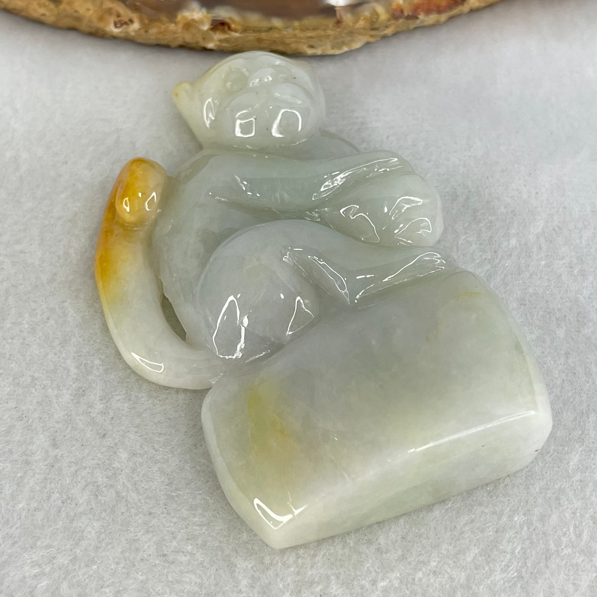 Type A Light Green with Brown Patches Jadeite Monkey Pendant 89.93g 77.0 by 47.9 by 17.1mm - Huangs Jadeite and Jewelry Pte Ltd