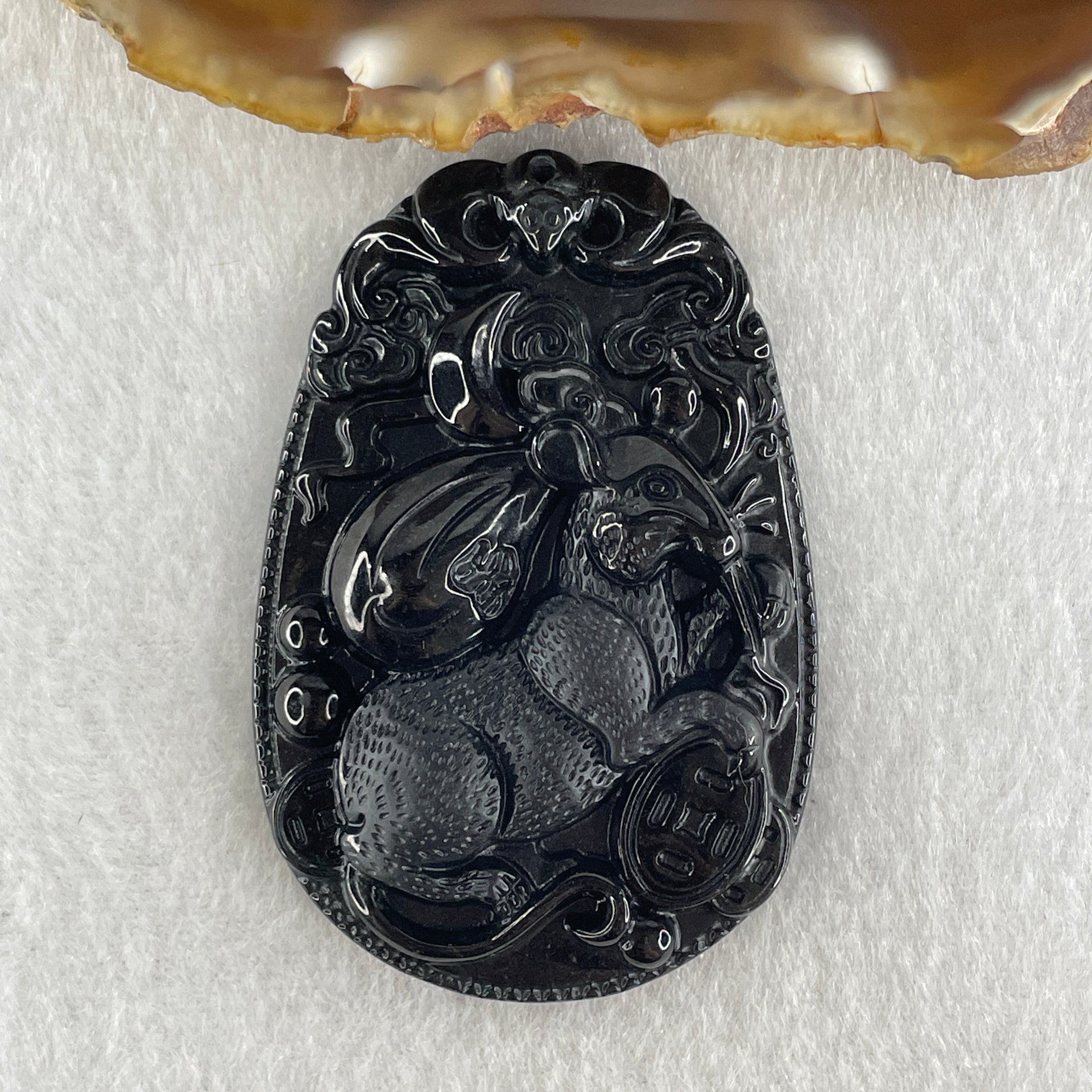 Type A Opaque to Partial Translucent Black Omphacite Jadeite Rat Pendant 25.17g 59.7 by 40.3 by 9.4mm - Huangs Jadeite and Jewelry Pte Ltd