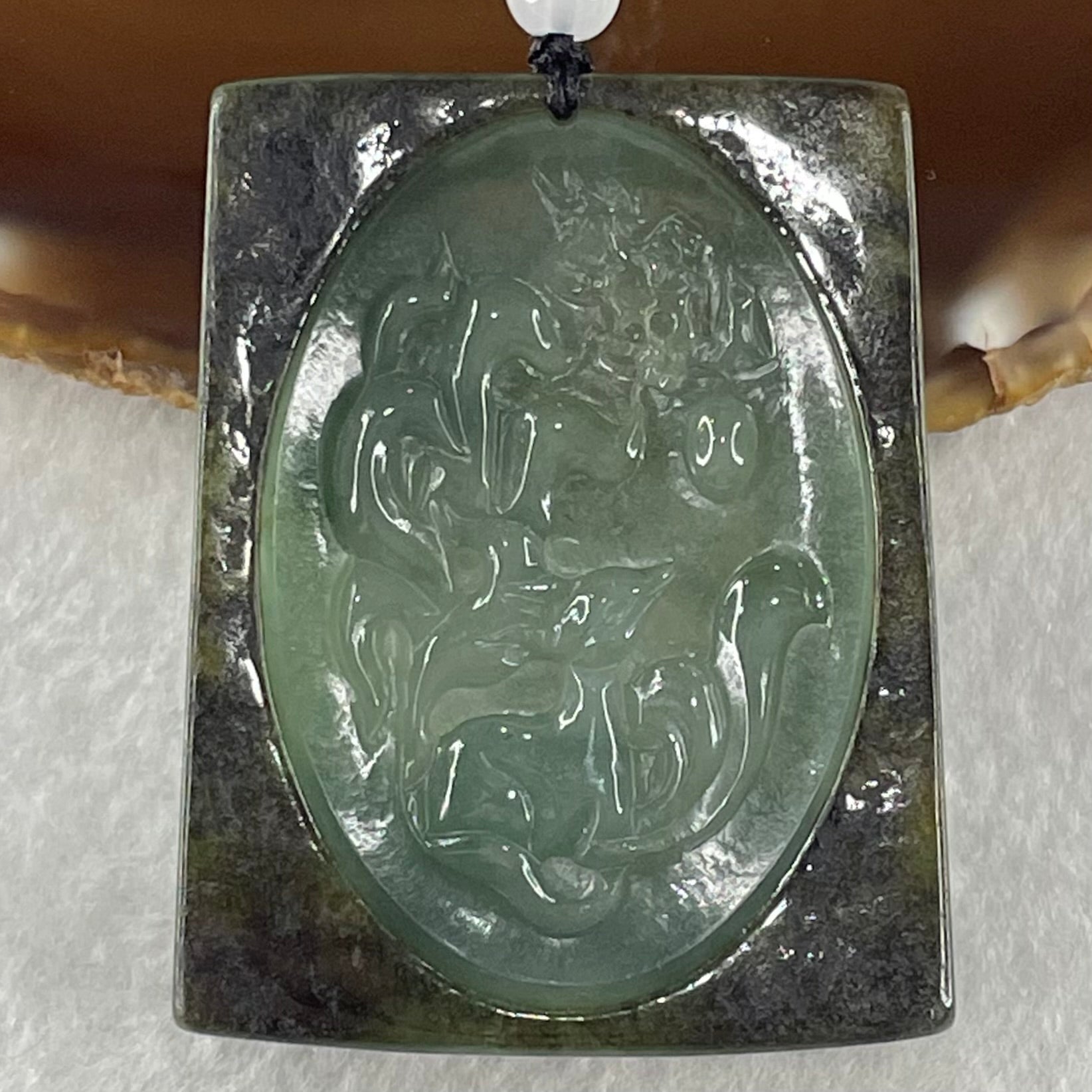 Grand Master Type A Blueish Green with Dark Brown Skin Jadeite 9 Tail Fox Pendant 41.48g 53.5 by 42.3 by 9.8mm - Huangs Jadeite and Jewelry Pte Ltd