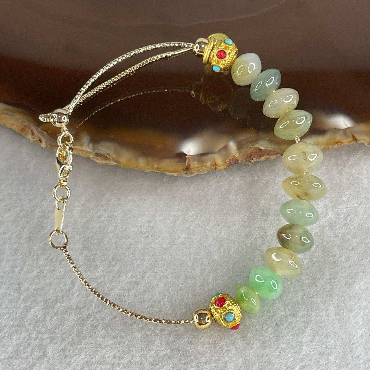 Natural Type A Semi-Icy Blueish Green Jadeite Bracelet | 11-Piece Donut Abacus Beads in Gold Color (10.38g, 15-18cm, 8.4mm)