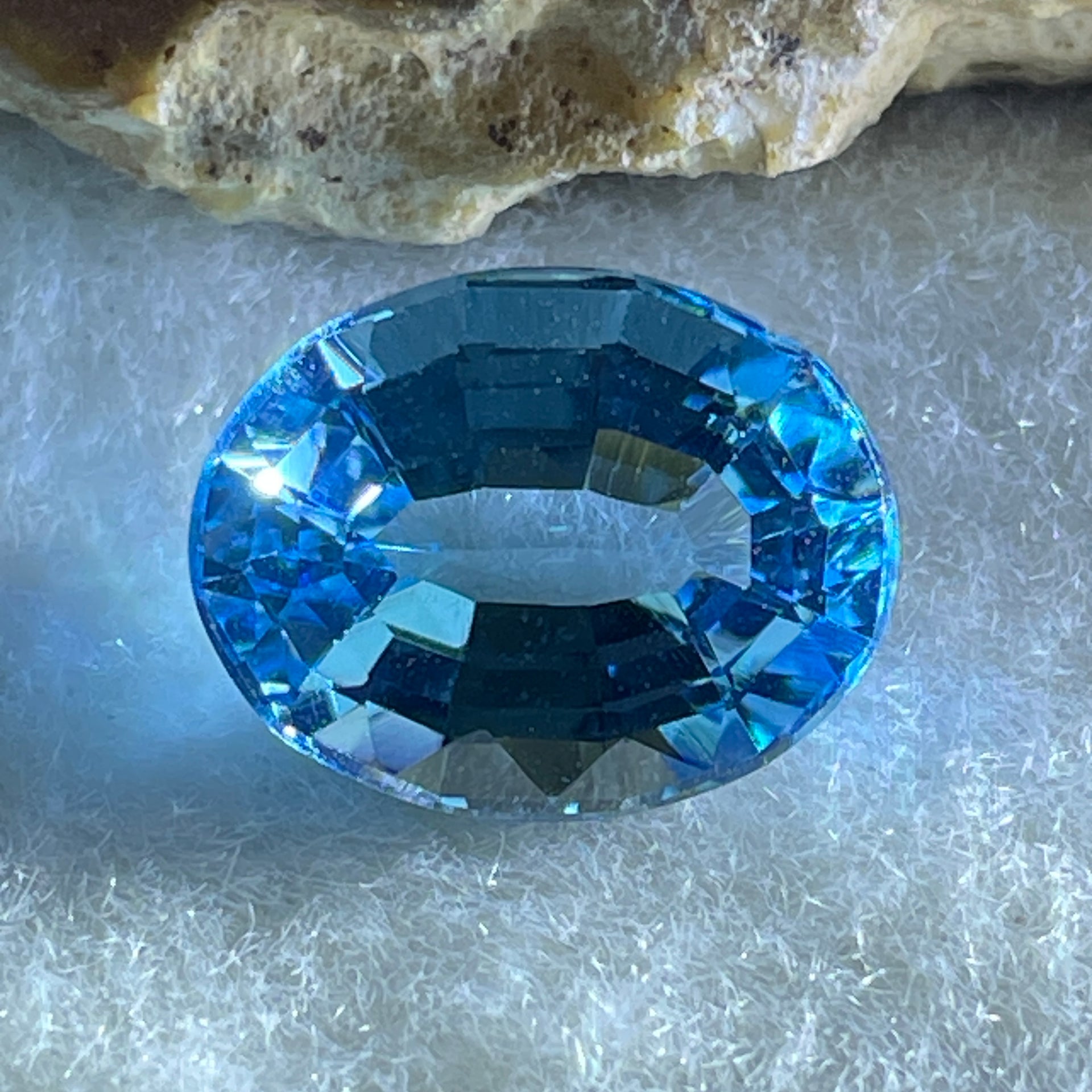 Natural Sky Blue Topaz Oval Shape 9.48ct 14.3 by 11.2 by 7.5mm - Huangs Jadeite and Jewelry Pte Ltd