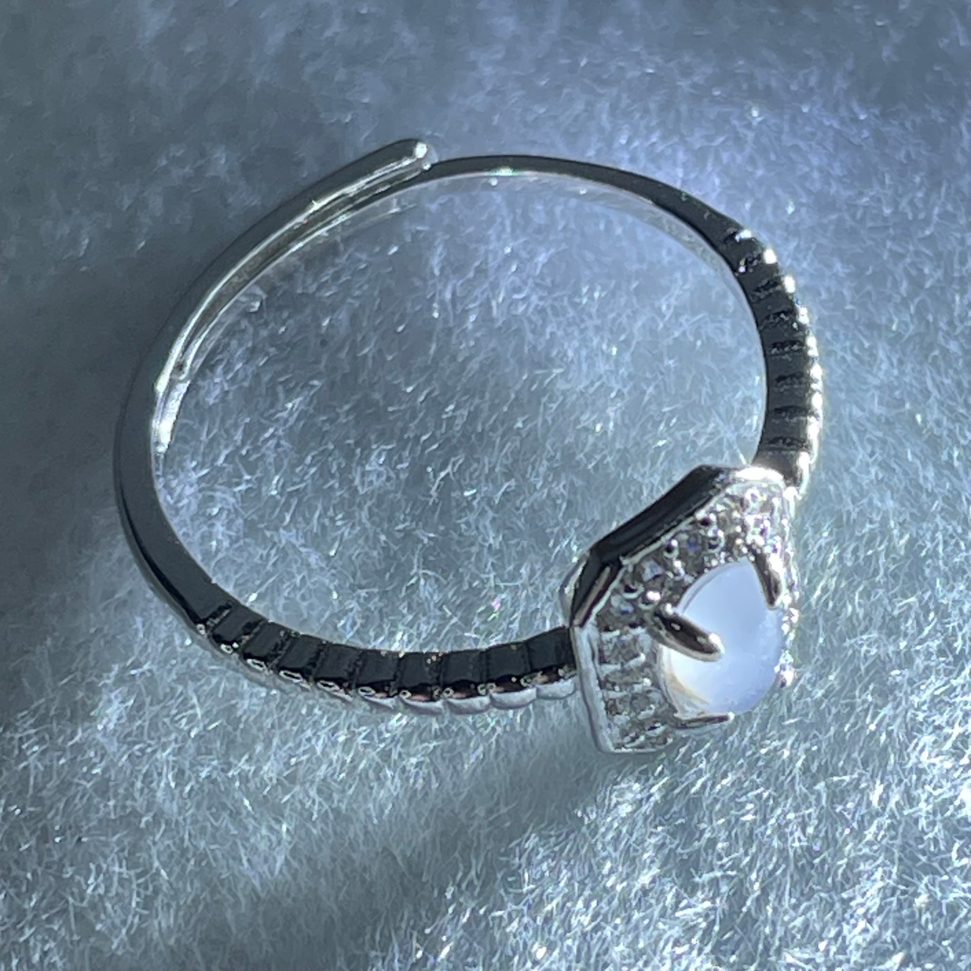 Type A Semi Icy Lavender Cabochon Jadeite in S925 Sliver Ring (Adjustable Size) 1.35g 5.6 by 4.2 by 2.0mm - Huangs Jadeite and Jewelry Pte Ltd