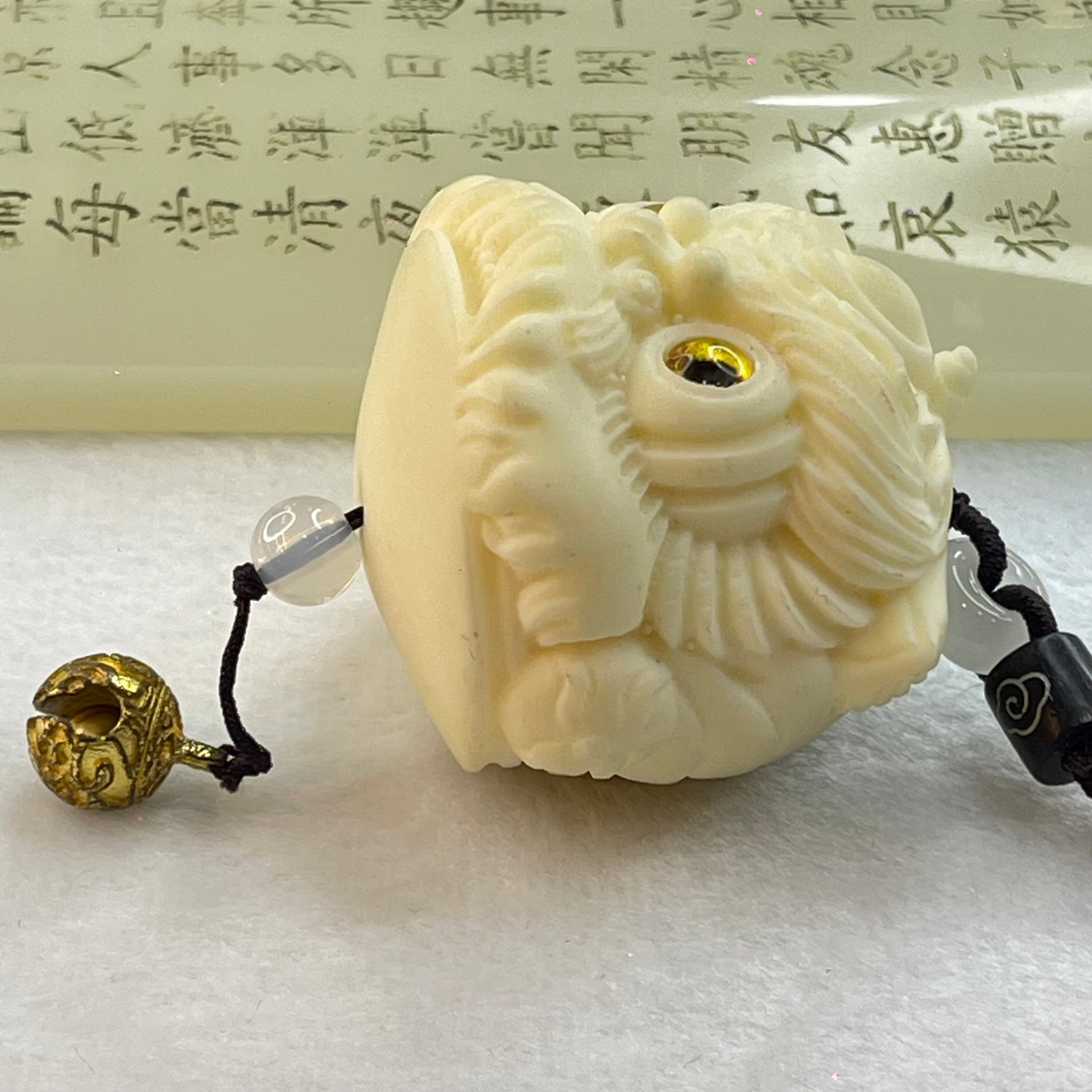 Ivory Fruit Seed Fu Gou Head Display 72.68g 43.1 by 47.0 by 41.7mm - Huangs Jadeite and Jewelry Pte Ltd