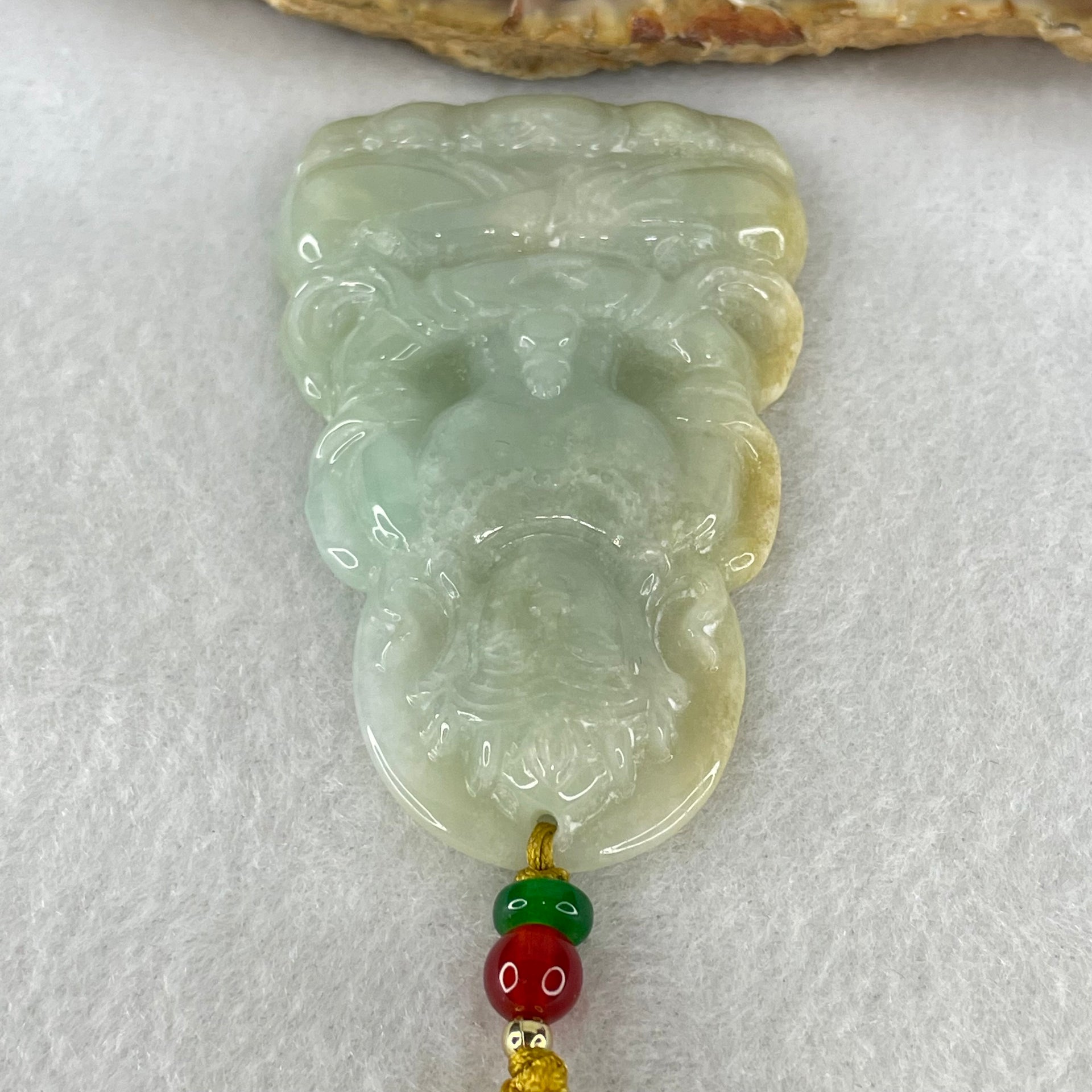 Type A Light Blueish Green with Yellow Jadeite Guan Yin Tara Pendant 29.14g 60.1 by 38.8 by 6.5mm - Huangs Jadeite and Jewelry Pte Ltd