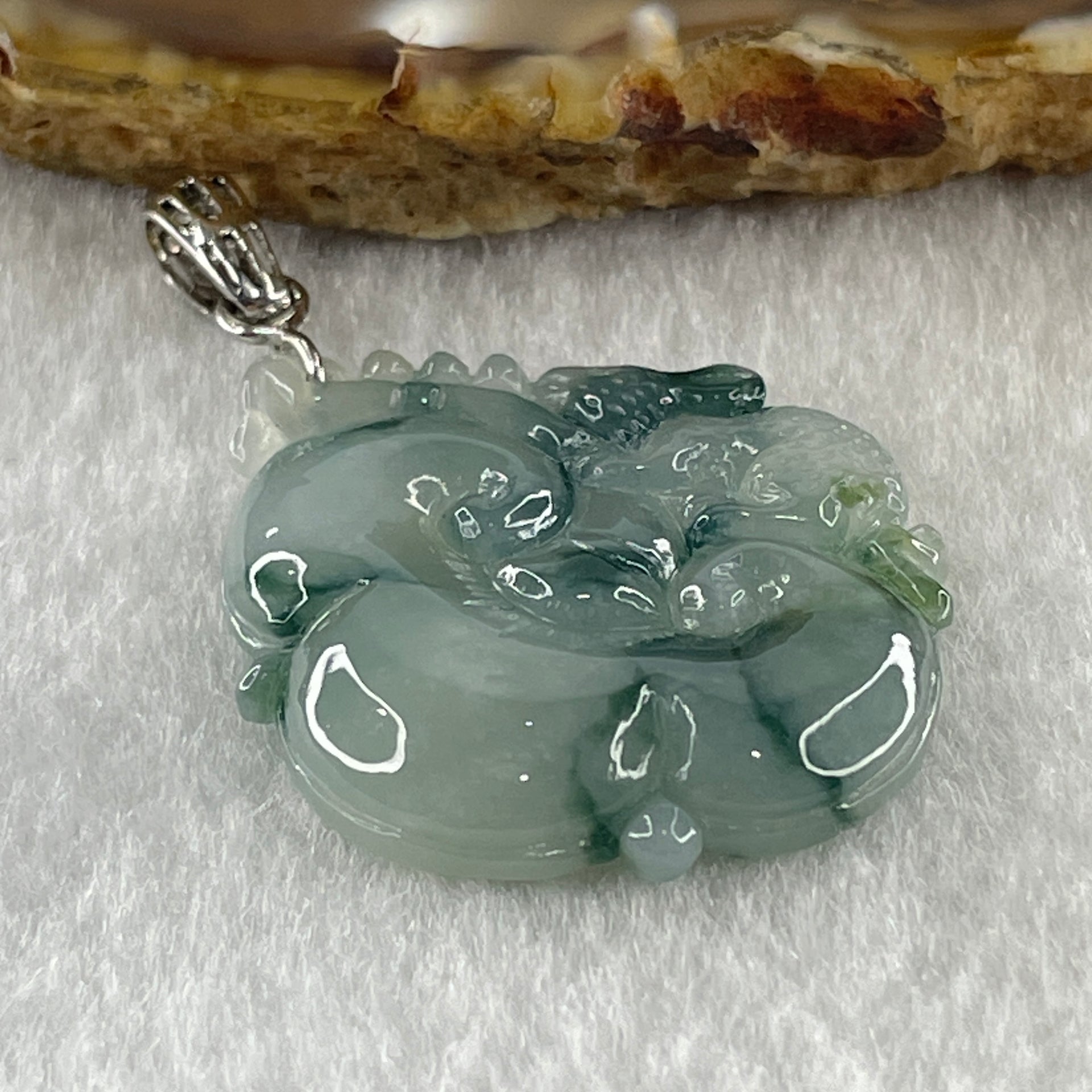 Type A Natural Semi Icy Blueish Green with Piao Hua Flora Jadeite Ruyi in S925 Silver Pendant 6.48g 32.2 by 21.4 by 5.1mm - Huangs Jadeite and Jewelry Pte Ltd