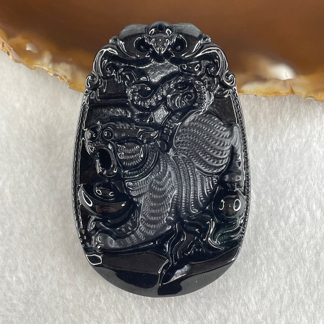 Type A Opaque to Partial Translucent Black Omphacite Jadeite Downhill Tiger Pendant 28.98g 60.9 by 39.8 by 9.0mm - Huangs Jadeite and Jewelry Pte Ltd