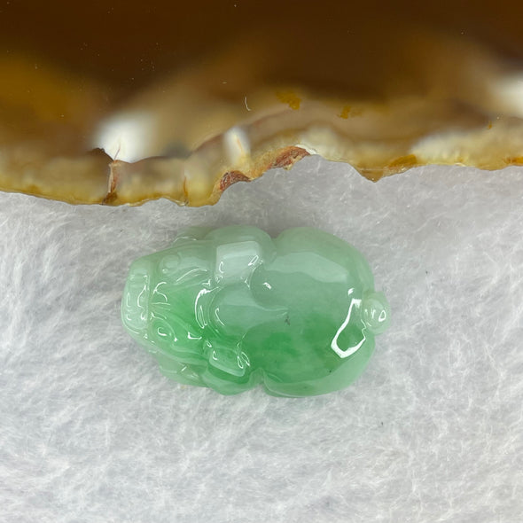 Type A Bright Green with Faint Lavender Jadeite Pixiu Pendent A货辣绿和浅紫罗兰翡翠貔貅吊坠 6.66g 22.7 by 15.6 by 9.6 mm - Huangs Jadeite and Jewelry Pte Ltd