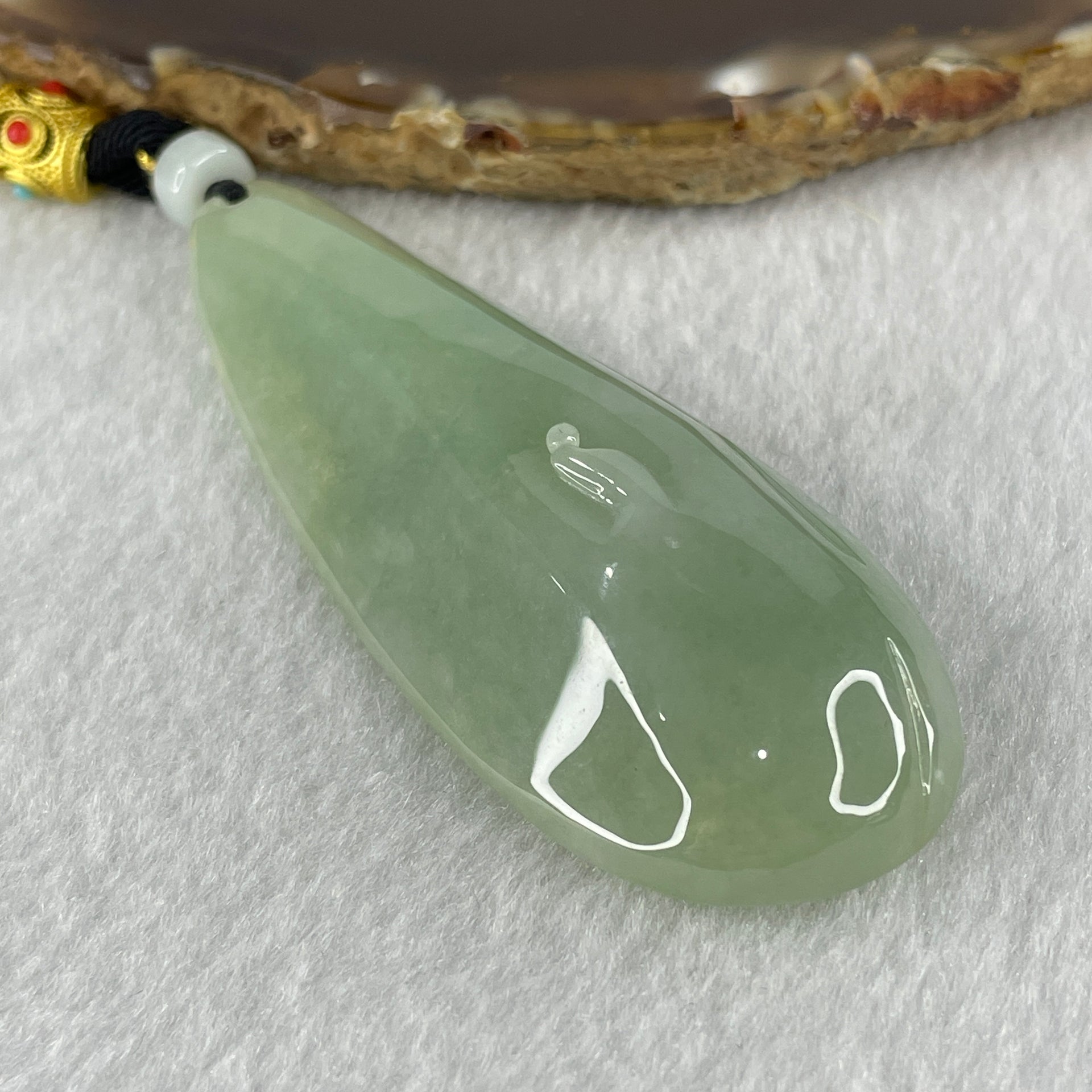 Natural Type A Light Green Jadeite People Seeking for Enlightenment Pendant 48.13g 70.6 by 28.5 by 13.8mm - Huangs Jadeite and Jewelry Pte Ltd