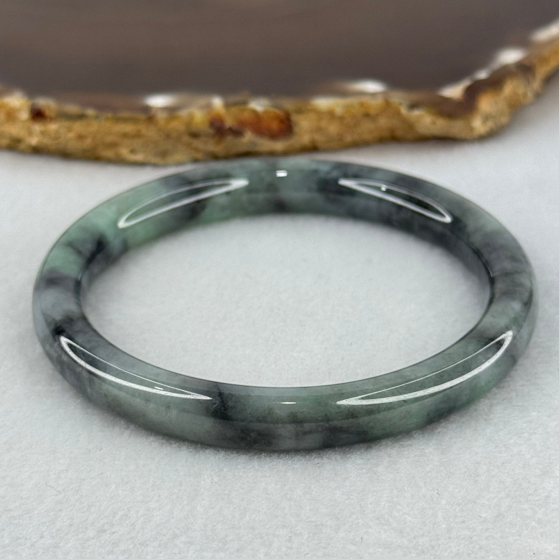 Type A Wuji Grey Black with Light Green Patch Jadeite Bangle Internal Diameter 52.2mm 27.55g 8.0 by 7.0mm - Huangs Jadeite and Jewelry Pte Ltd