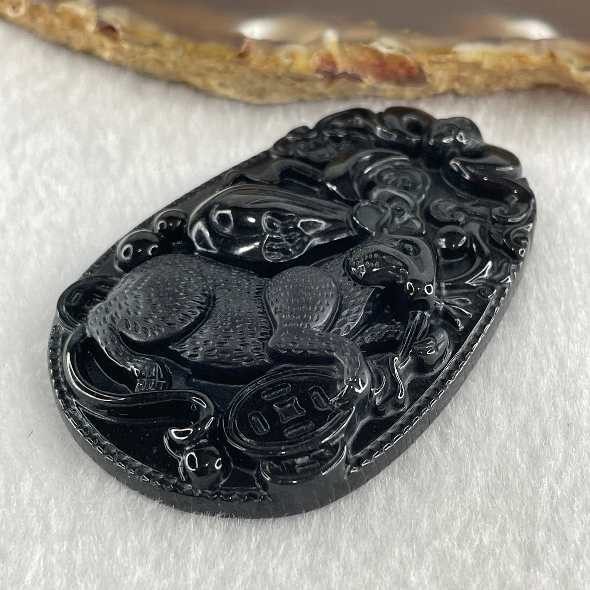 Type A Opaque to Partial Translucent Black Omphacite Jadeite Rat Pendant 25.17g 59.7 by 40.3 by 9.4mm - Huangs Jadeite and Jewelry Pte Ltd