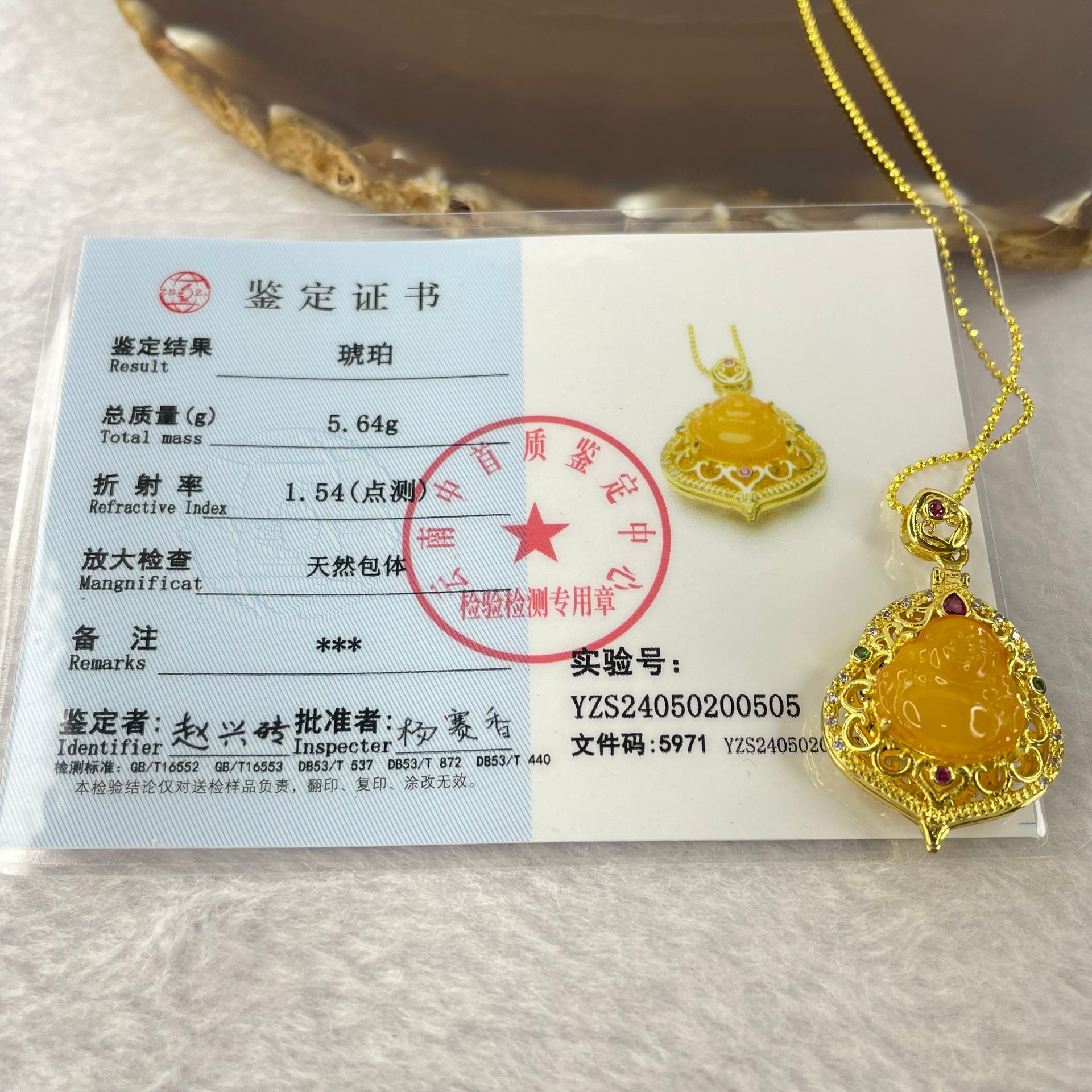 Natural Butterscotch Amber Milo Buddha with Crystals in Gold Color Necklace 5.64g 12.2 by 11.8 by 3.2mm - Huangs Jadeite and Jewelry Pte Ltd