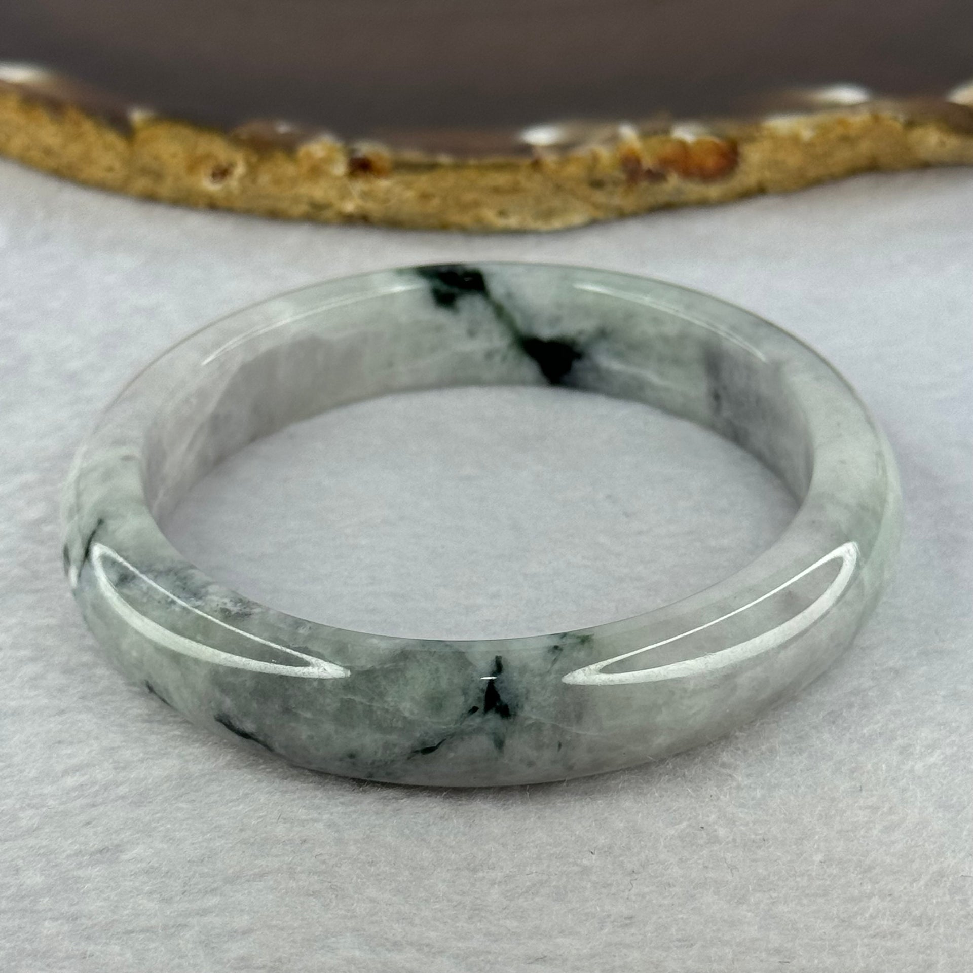 Type A Green Lavender with Dark Green Patches 50.67g Internal Diameter 57.5mm 12.6 by 8.2mm (Internal Lines) - Huangs Jadeite and Jewelry Pte Ltd