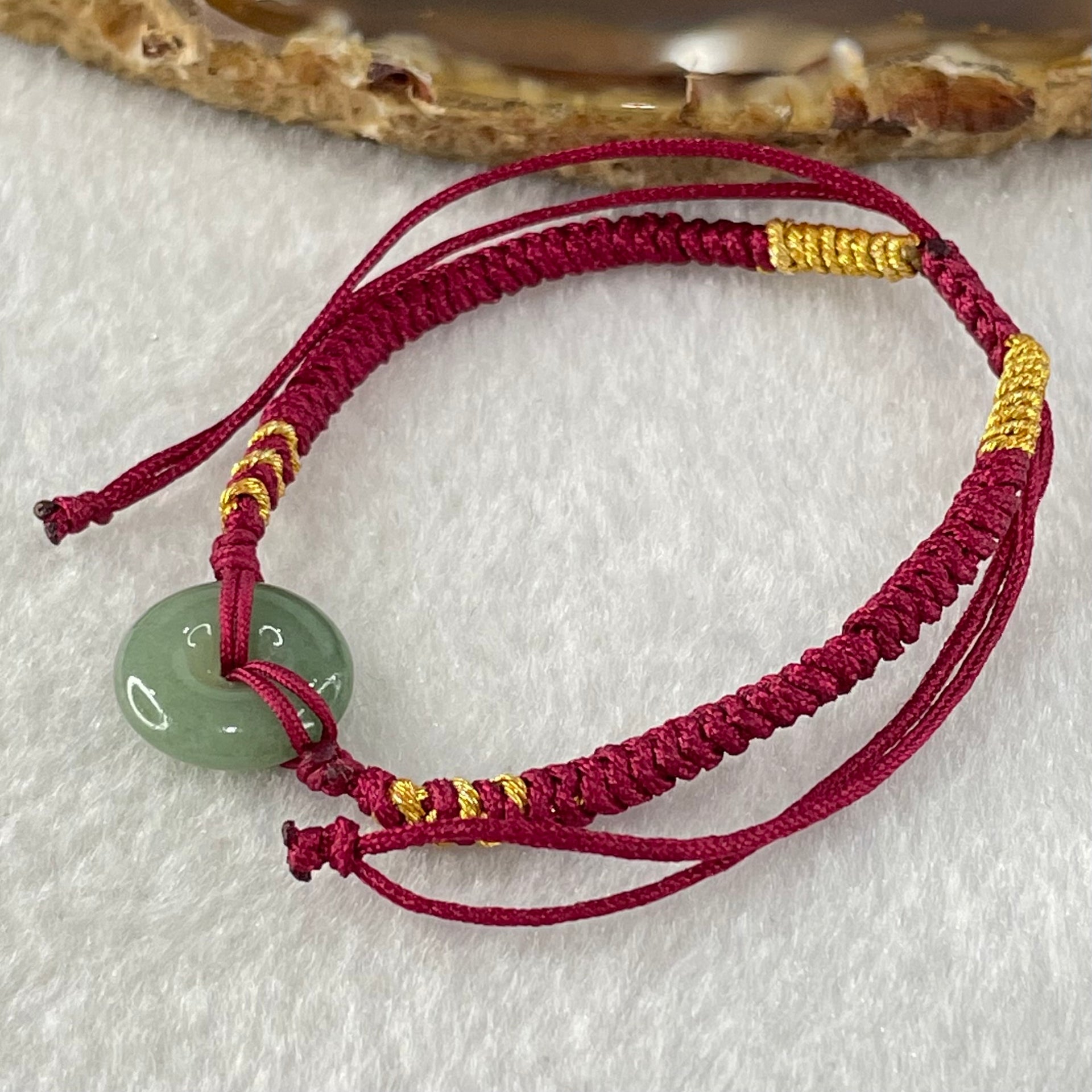 Type A Blueish Green Jadeite Ping An Kou Donut In String Bracelet 1.90g 12.5 by 3.8mm - Huangs Jadeite and Jewelry Pte Ltd