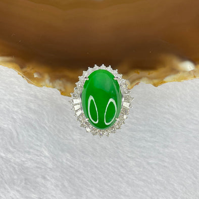 Very Very High Quality Highly Translucent Natural Intense Green Jadeite (TYPE A) Oval Cabochon Approx. 20.93 by 13.95 by 6.58mm Total Weight 13.60g including Natural Diamonds and 13K White Gold Ring Setting with NGI Cert No.82835781 - Huangs Jadeite and Jewelry Pte Ltd