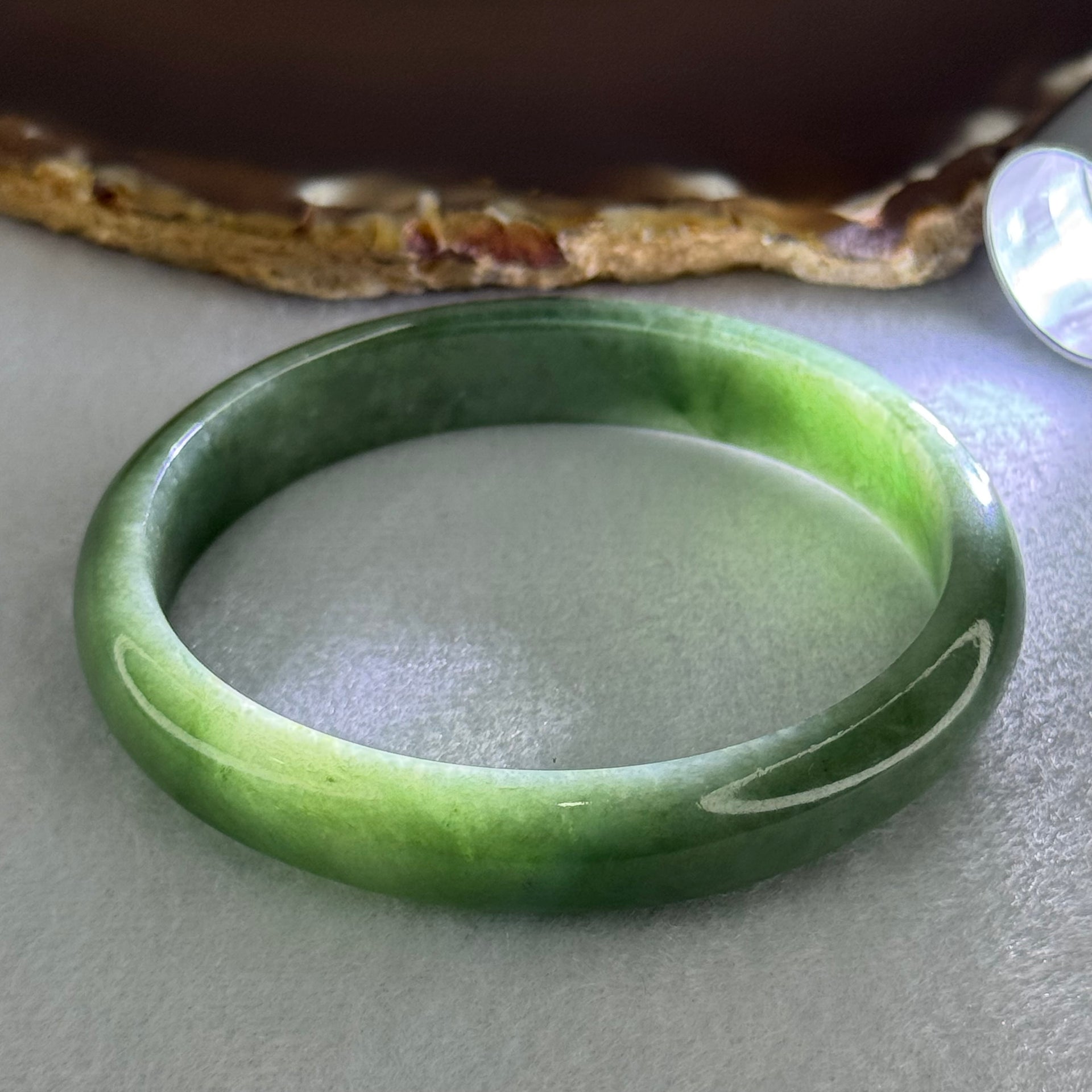 Type A Blueish Green Jadeite Oval Bangle Internal Diameter 58.7mm 38.10g 12.0 by 6.6mm (Very Fine Internal Lines) - Huangs Jadeite and Jewelry Pte Ltd