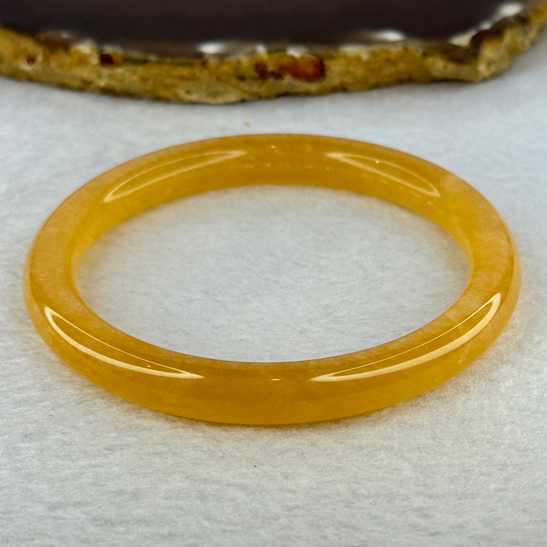 Transparent Orangey Yellow Quartzite Jade Bangle 天山玉手镯 Internal Diameter 59.4mm 29.90g 8.6 by 8.2mm - Huangs Jadeite and Jewelry Pte Ltd