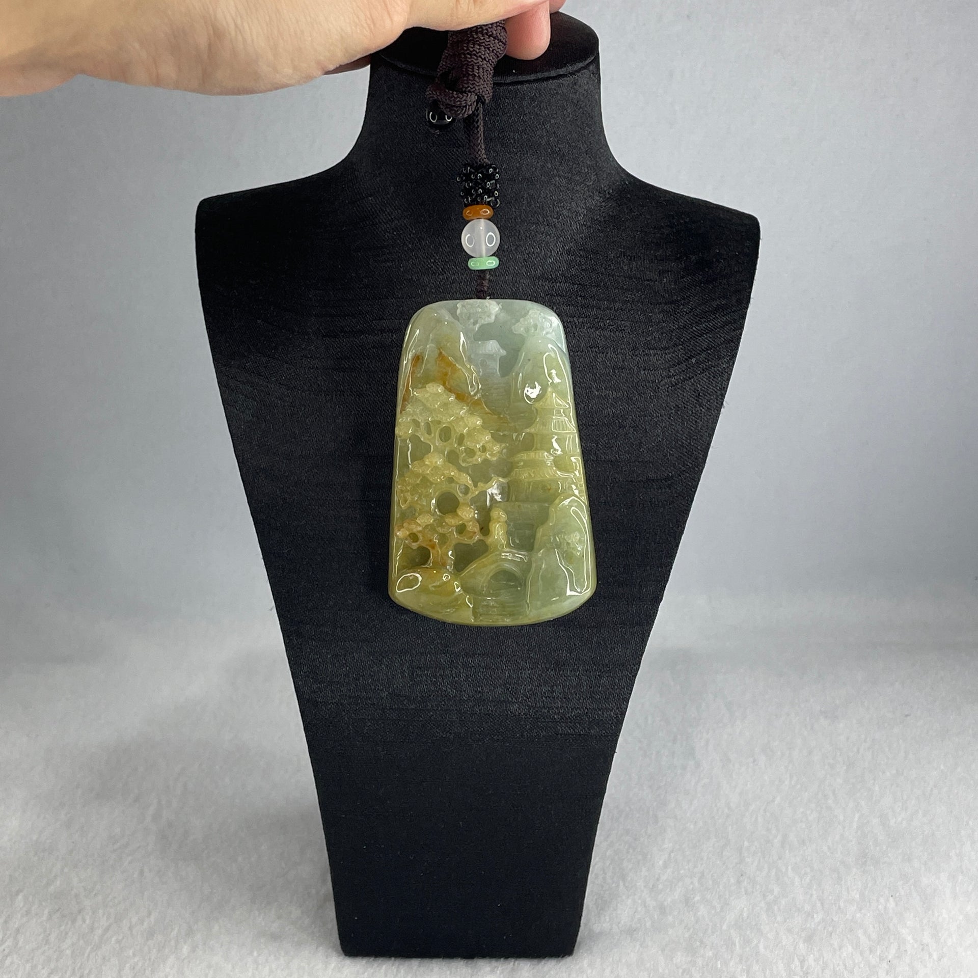 Natural Type A Yellowish Green with Sky Blue Jadeite Shan Shui with Gui Ren Benefactor Pendant 76.29g 67.4 by 43.0 by 12.0mm - Huangs Jadeite and Jewelry Pte Ltd