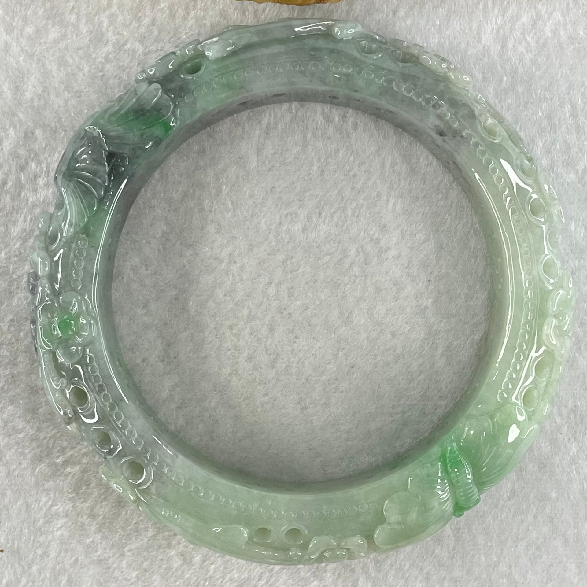 Type A Light to Dark Blueish Green Jadeite Carved with Prosperity Flowers Twin Birds and Butterfly Bangle 78.70g Internal Diameter 55.0mm 15.7 by 11.0mm - Huangs Jadeite and Jewelry Pte Ltd