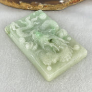 Type A Light Apple Green Jadeite Dragon Pendant 87.90g 69.4 by 44.2 by 14.2mm - Huangs Jadeite and Jewelry Pte Ltd