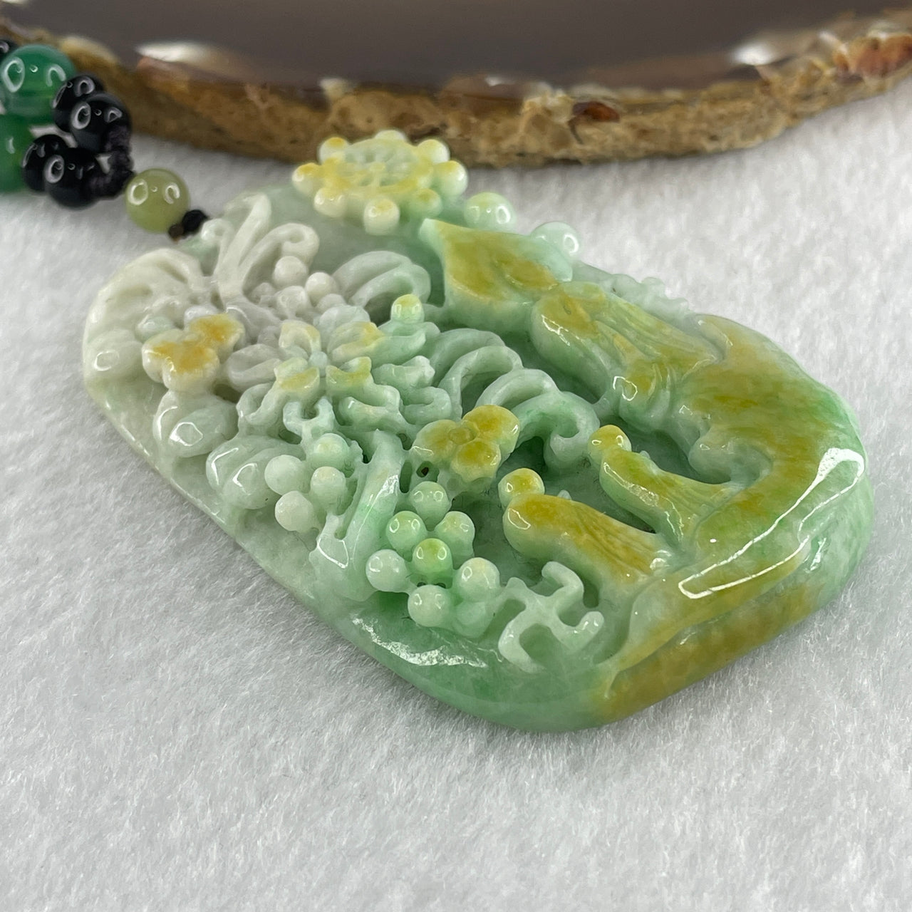Natural Type A Blueish Green with Yellow Jadeite Buddha and Flowers with People Seeking for Enlightenment Pendant 87.75g 72.8 by 45.7 by 11.8mm