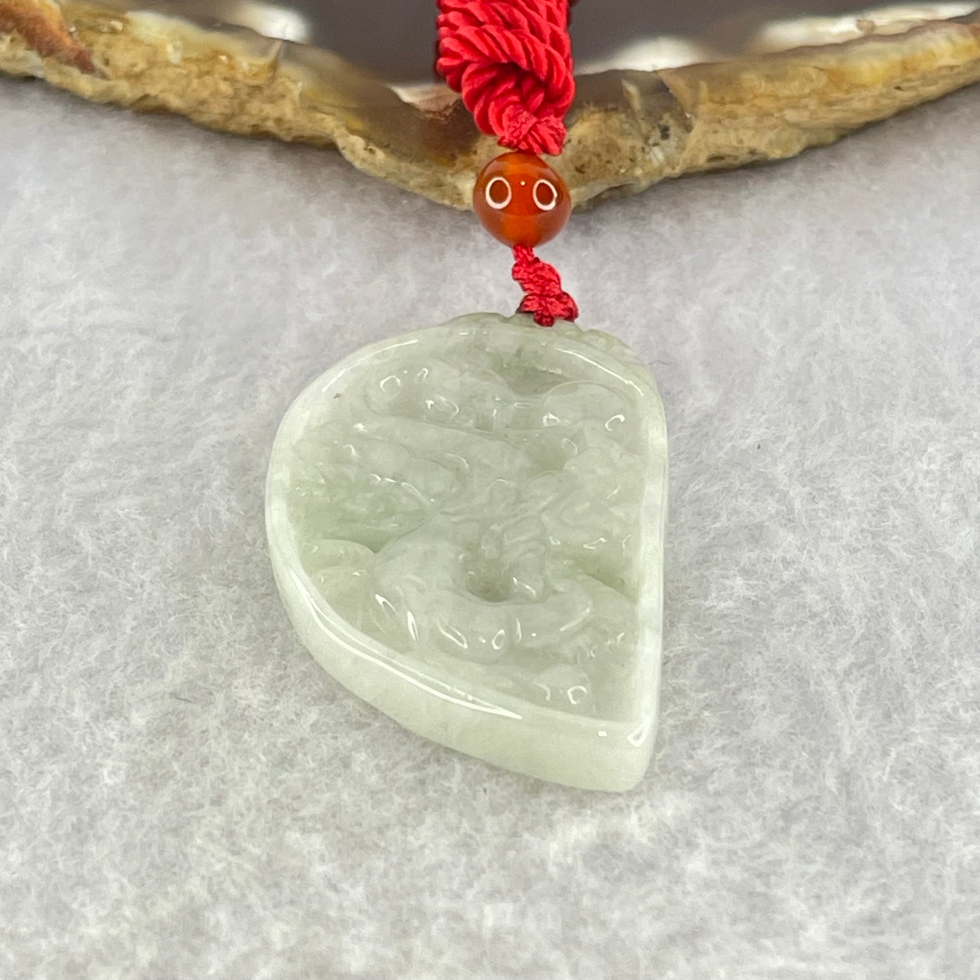 Type A Faint Green Lavender Dragon Half Heart Pendant 11.35g 40.0 by 23.9 by 4.7mm - Huangs Jadeite and Jewelry Pte Ltd