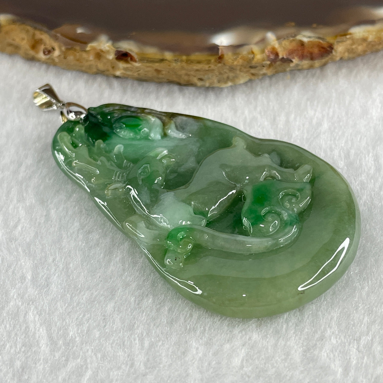 Natural Type A Green with Emerald Green and Brown Patches Jadeite Deer and Ruyi Pendant in S925 Silver Clasp 26.44g 56.4 by 36.1 by 6.4mm
