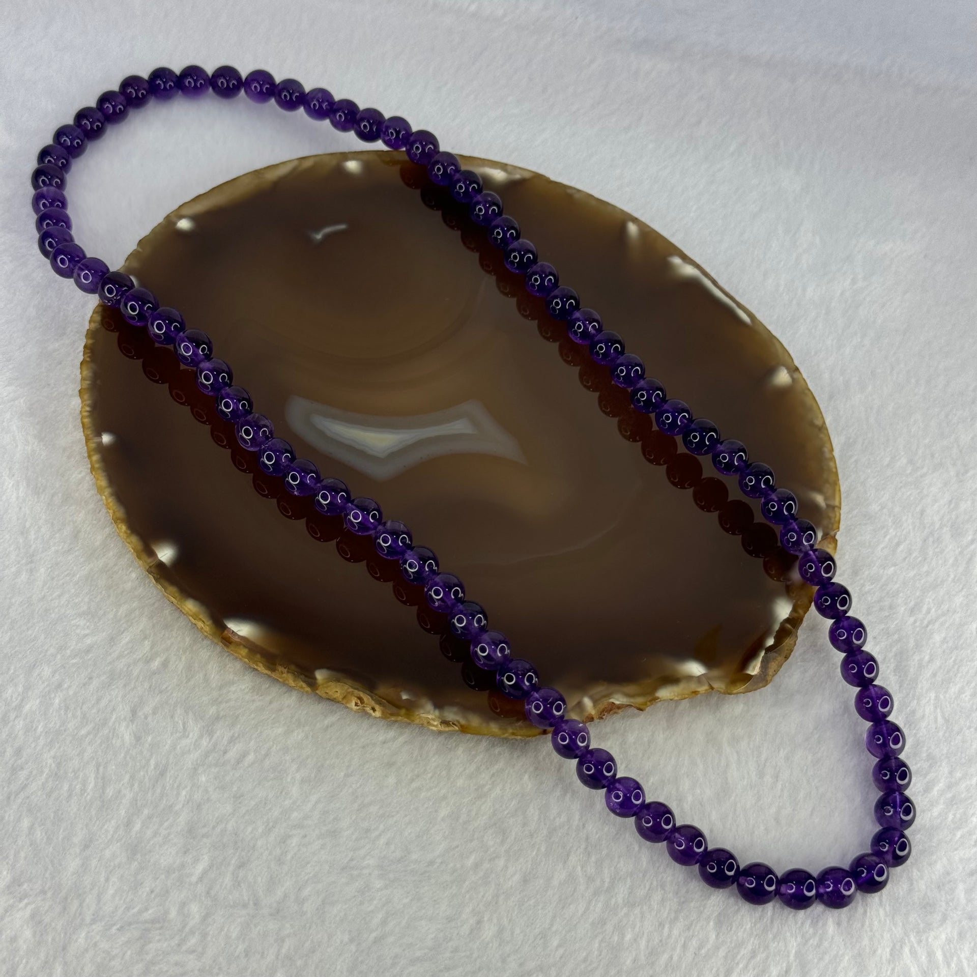 Good Grade Natural Amethyst Necklace 46.18g 53cm 7.8mm 75 Beads - Huangs Jadeite and Jewelry Pte Ltd