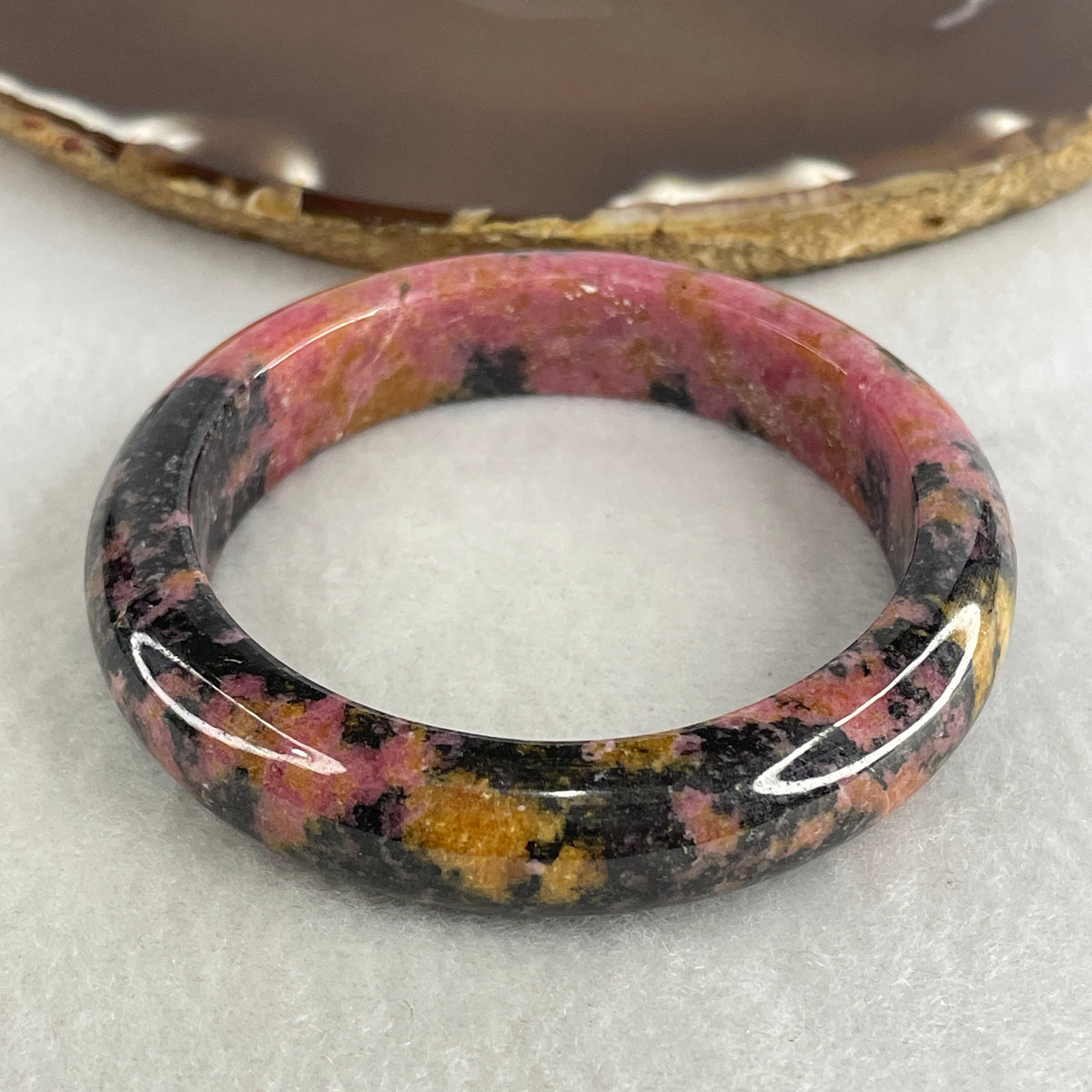 Natural Pink & Black Rhodonite Bangle | (62.70g | 53.0mm Inner Diameter | 12.8x8.6mm | Heart & Root Chakra Synergy, Emotional Healing, Self-Love, Courage & Shield)