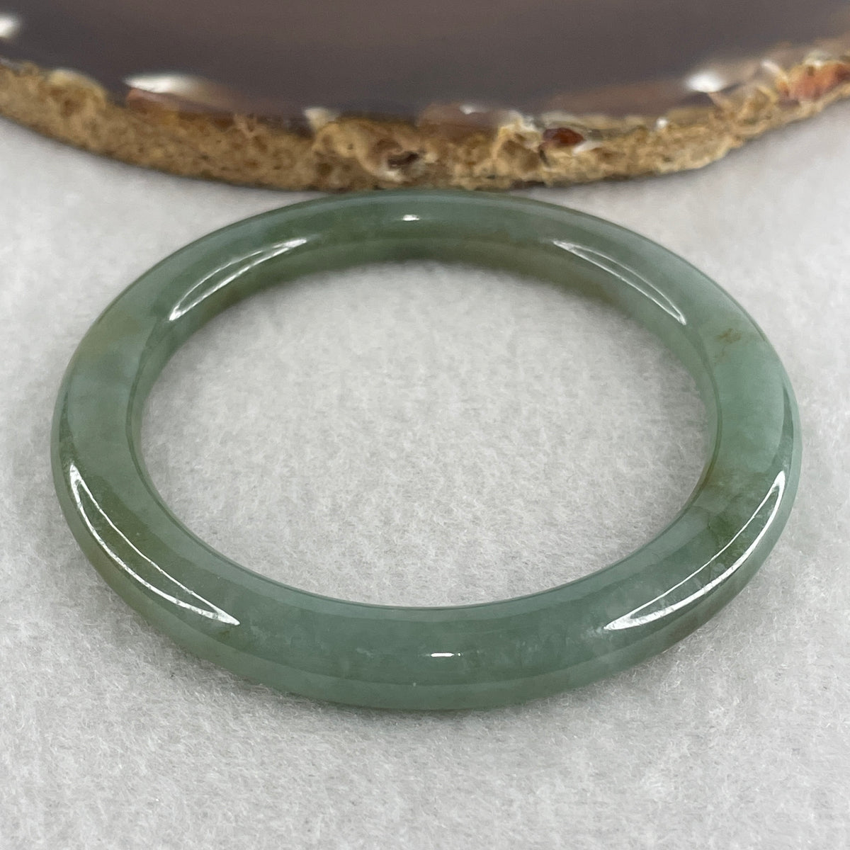 Natural Type A Blueish Green Piao Hua Jadeite Flat Ding Dang Bangle 27.60g Inner Diameter 51.3mm 7.0 by 7.9mm (Very Slight External Line) - Huangs Jadeite and Jewelry Pte Ltd