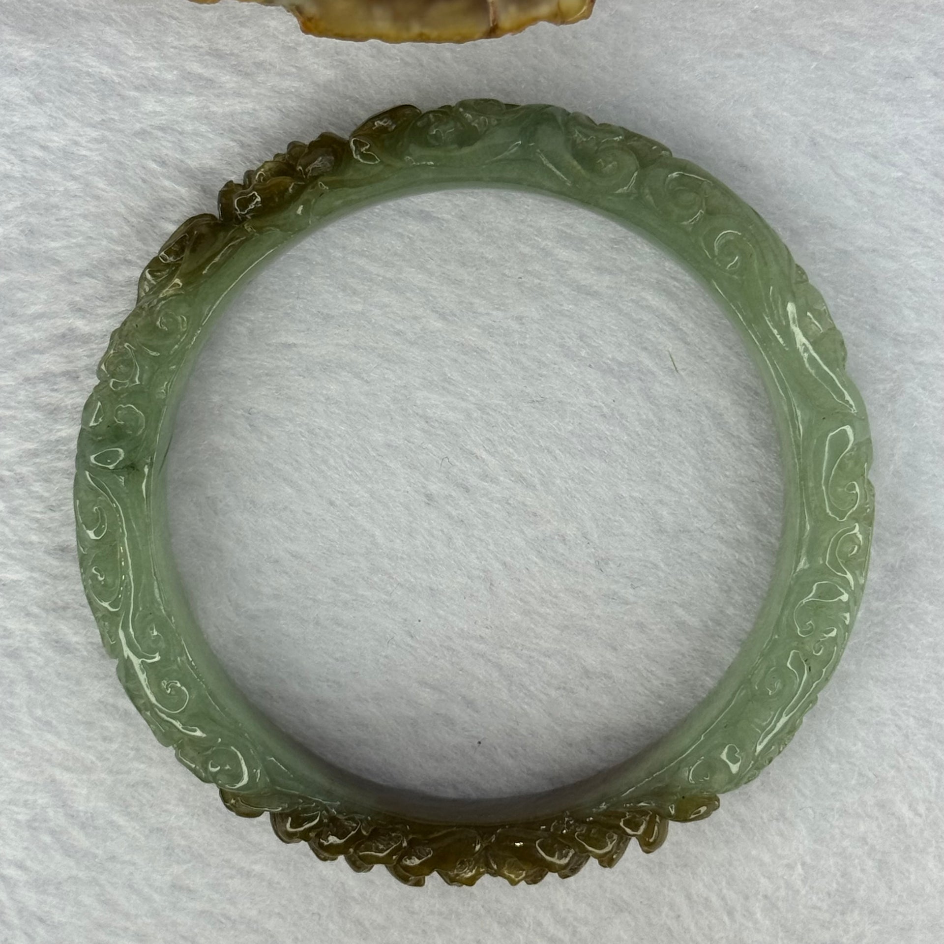 Type A Blueish Green and Brown Patches Jadeite Lotus Flowers Bangle 39.19g Internal Diameter 55.2mm 10.9 by 8.2mm - Huangs Jadeite and Jewelry Pte Ltd