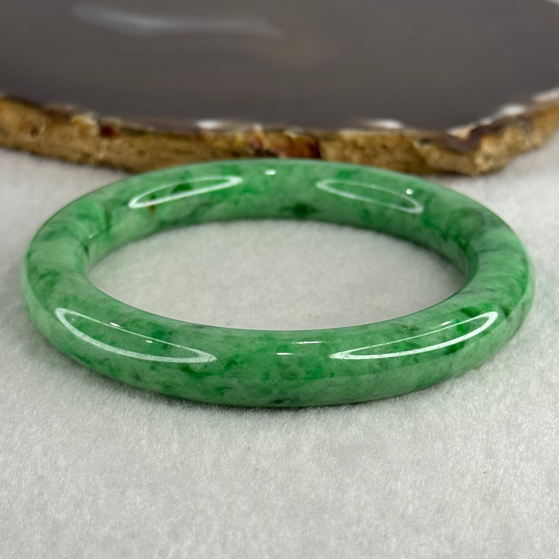 Type A Apple Green Jade Jadeite Bangle 60.77g Inner Diameter: 59.2mm Thickness: 10.2 by 10.4mm (Very Very Slight Internal Lines) - Huangs Jadeite and Jewelry Pte Ltd