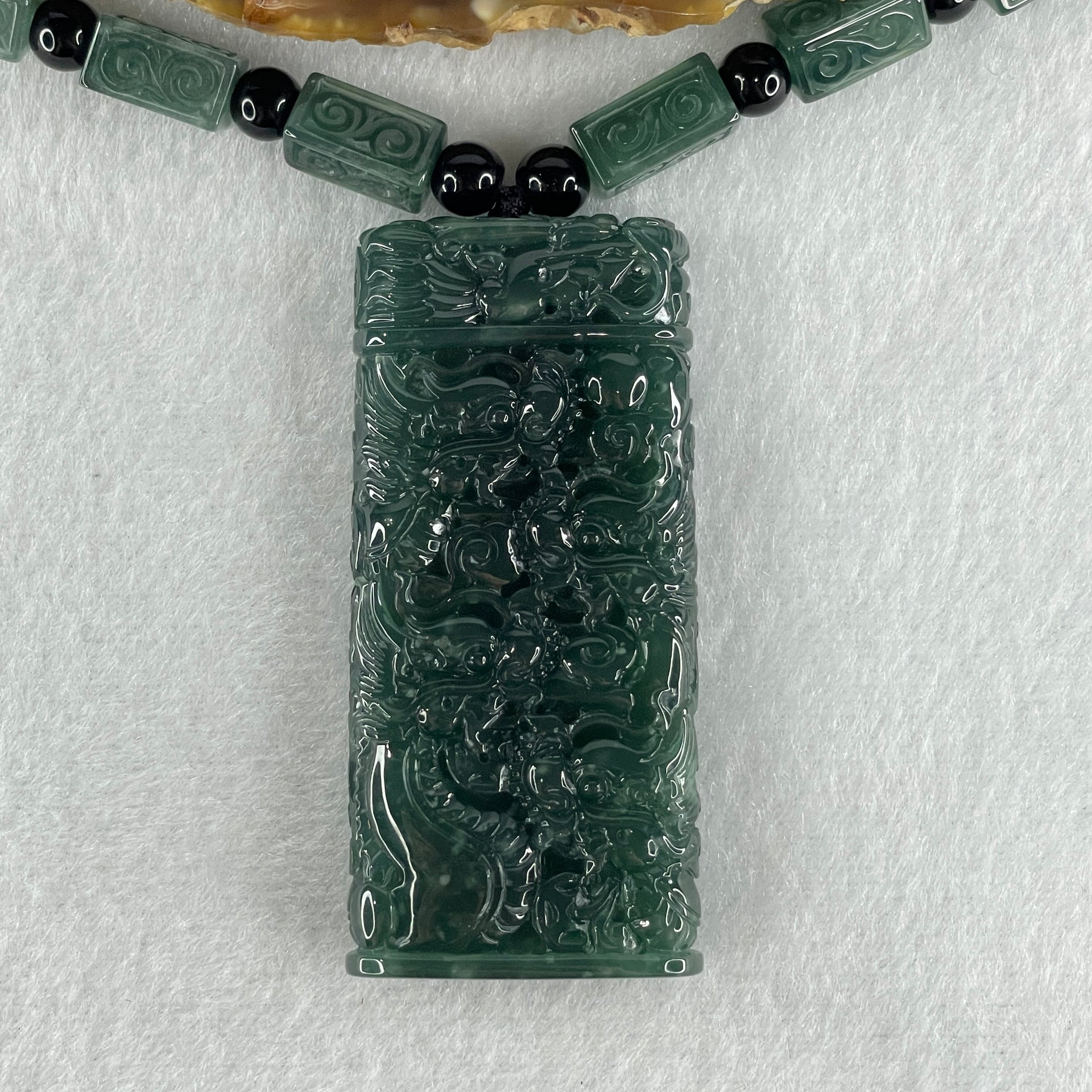 Type A Jelly Blueish Green Jadeite 9 Dragon Double Side Pendant 121.51g 62.8 by 28.9 by 11.5mm - Huangs Jadeite and Jewelry Pte Ltd